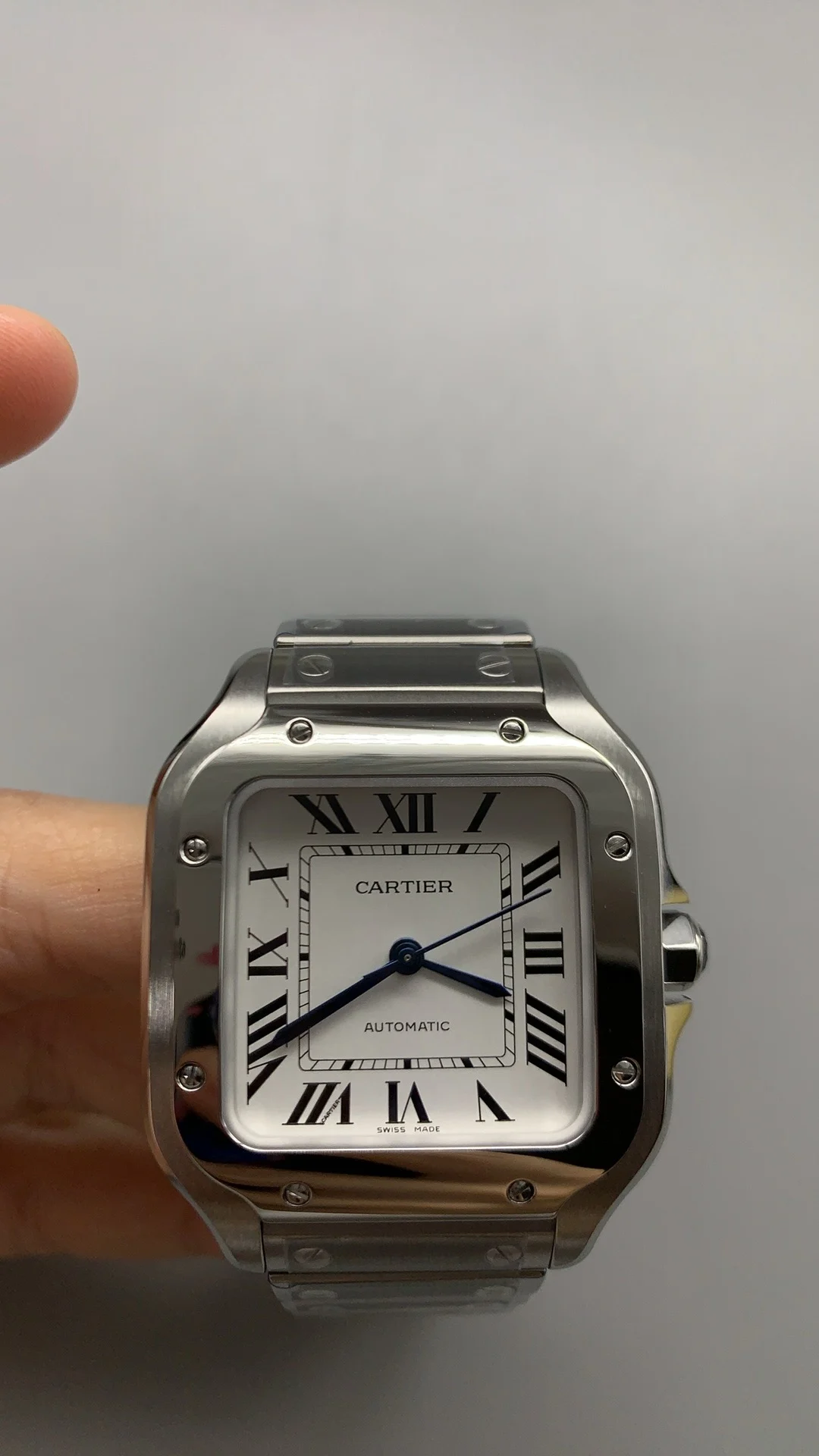 Cartier Santos Black Dial 35mm — photographed off the sweep