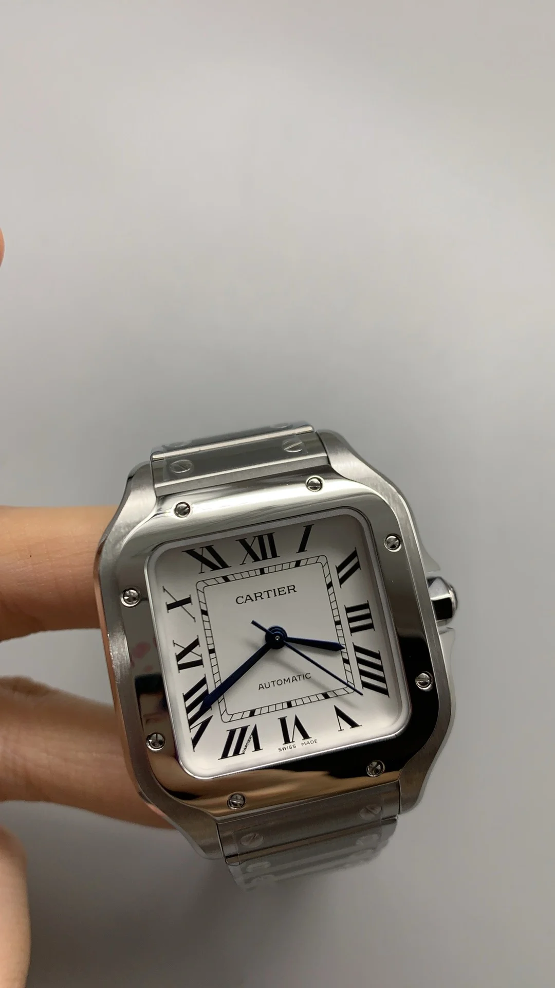 Cartier Santos Black Dial 35mm — photographed off the sweep