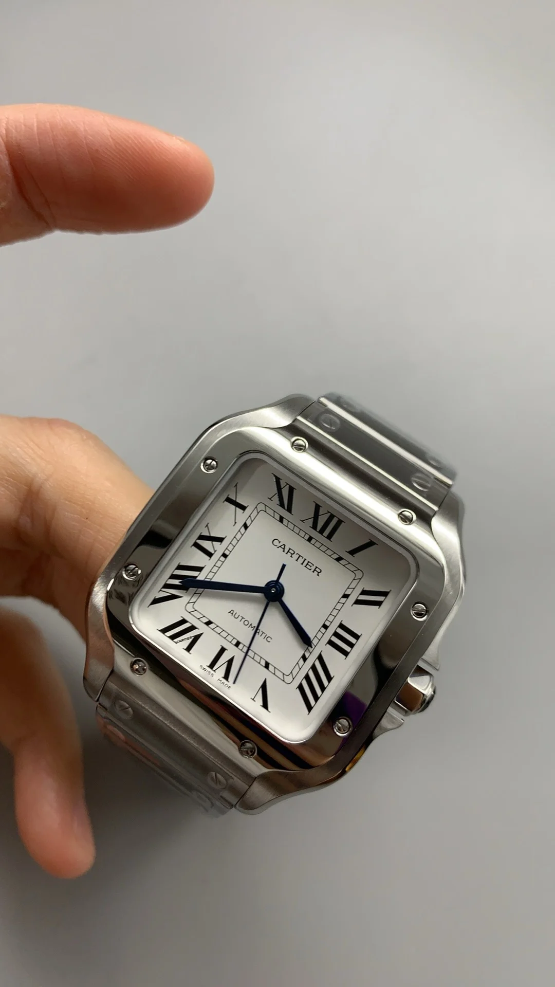 Cartier Santos Black Dial 35mm — photographed off the sweep