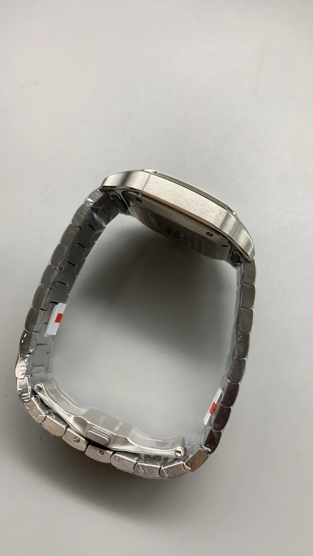Cartier Santos Black Dial 35mm — photographed off the sweep