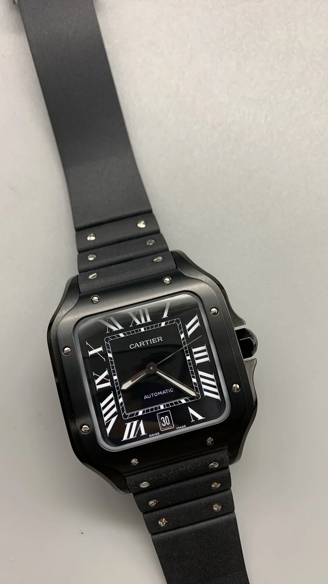 Cartier Santos Black Dial 40mm — photographed off the sweep