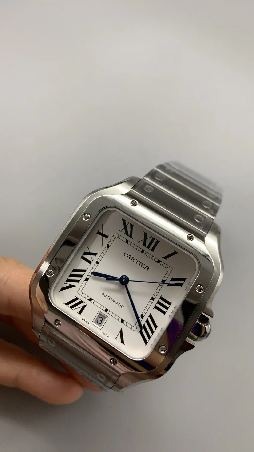 Cartier Santos Black Dial 40mm — photographed off the sweep