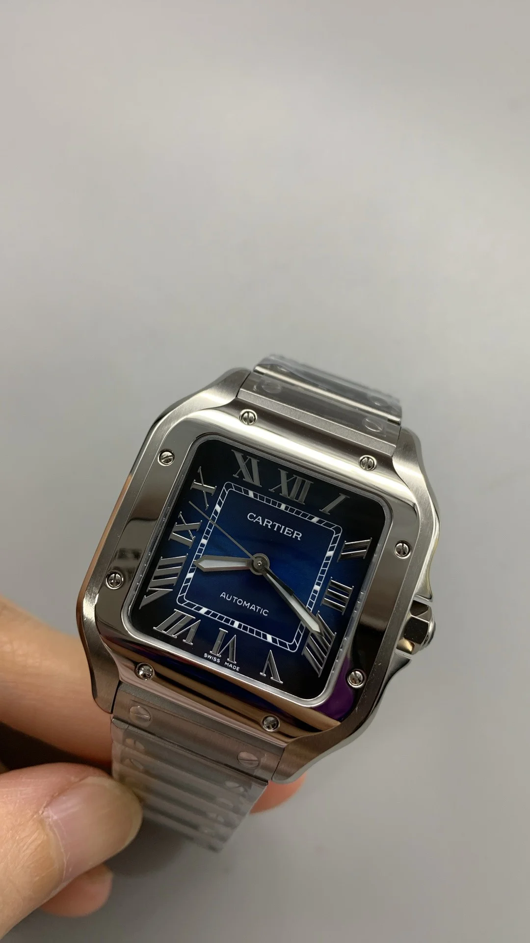 Cartier Santos Blue Dial 35mm — photographed off the sweep