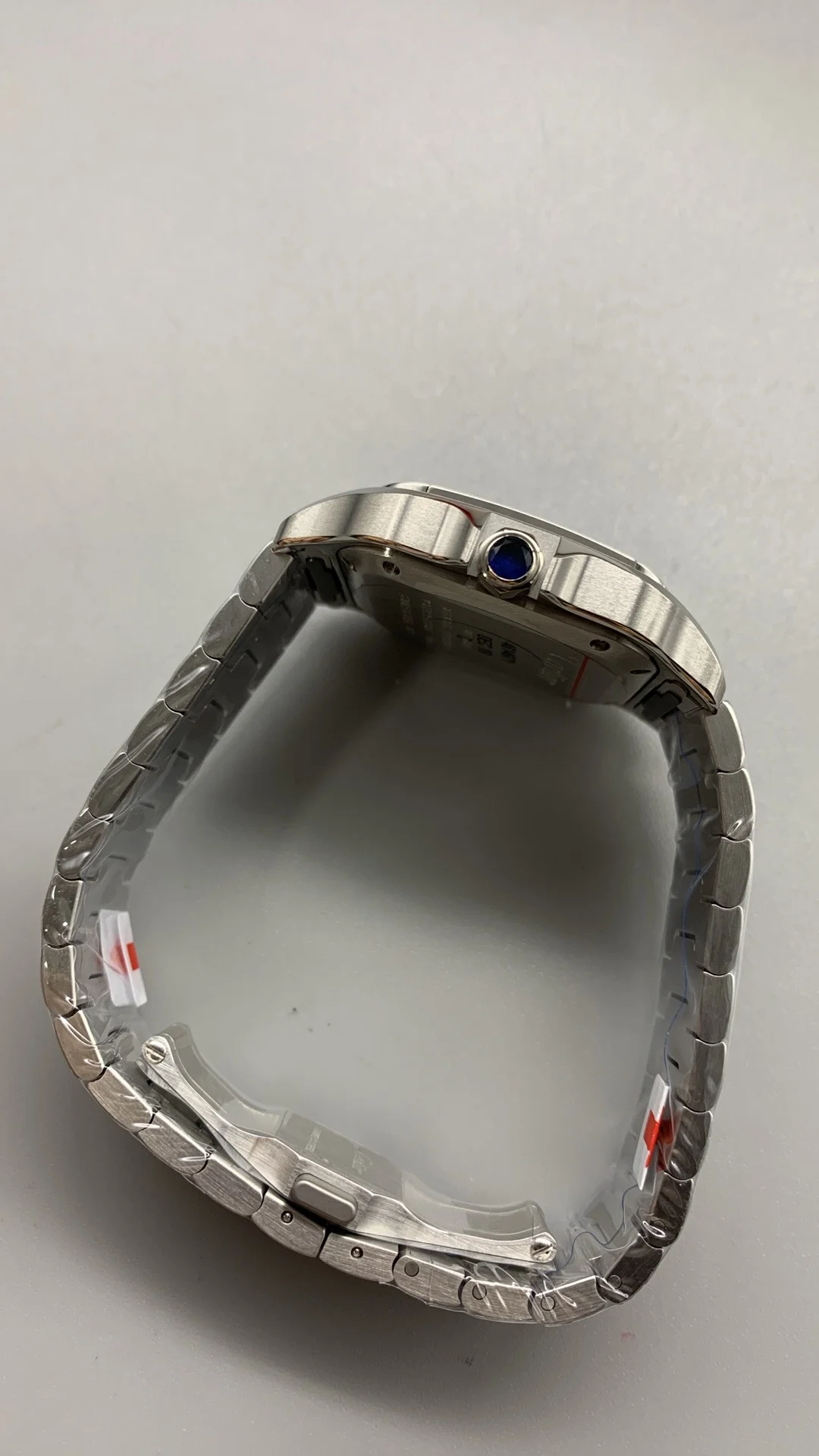 Cartier Santos Blue Dial 35mm — photographed off the sweep