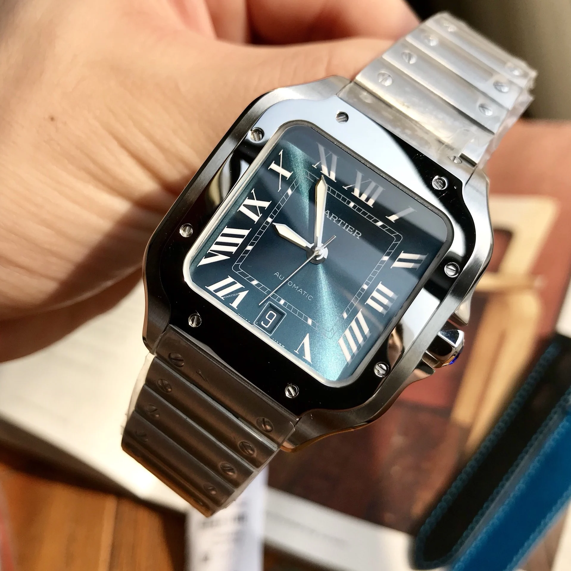 Cartier Santos Blue Dial 40mm — photographed off the sweep