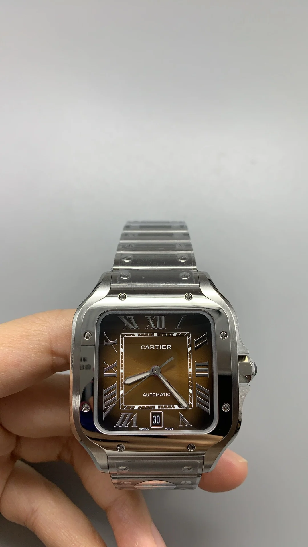 Cartier Santos Brown Dial 39.8mm — photographed off the sweep