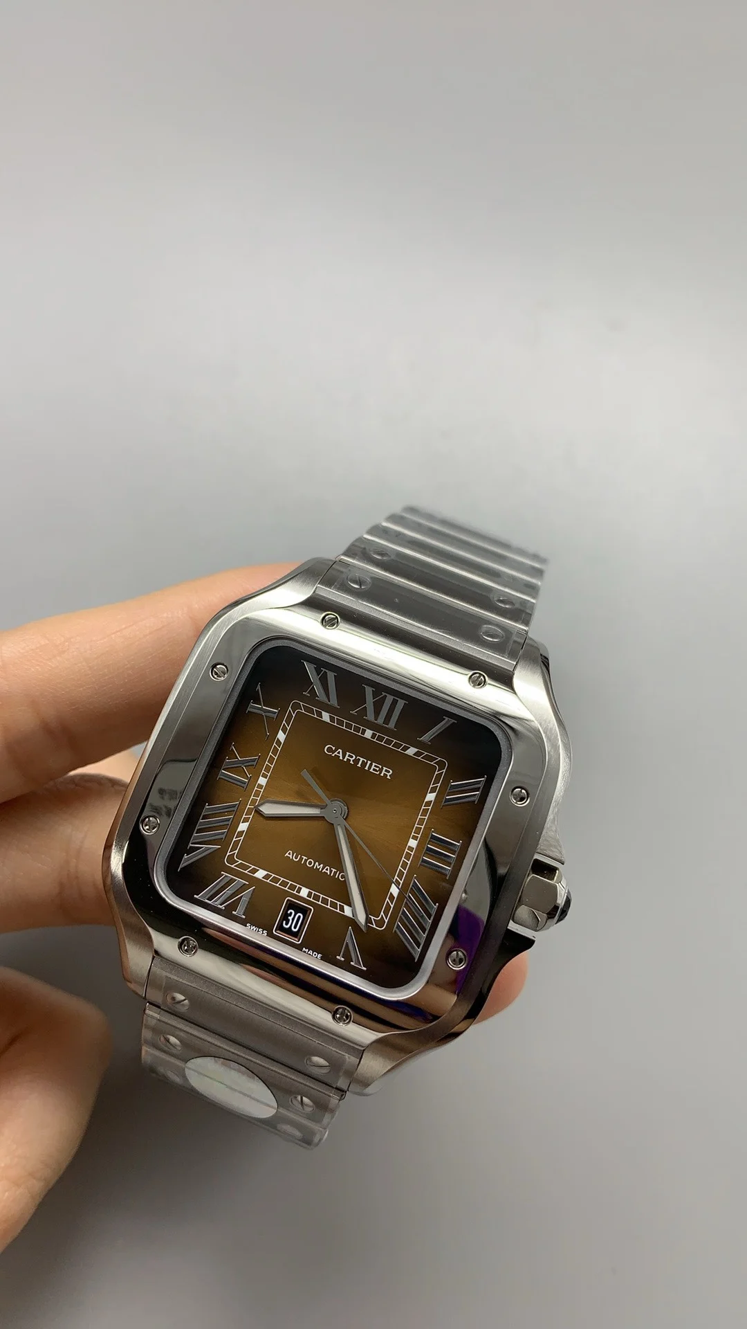 Cartier Santos Brown Dial 39.8mm — photographed off the sweep