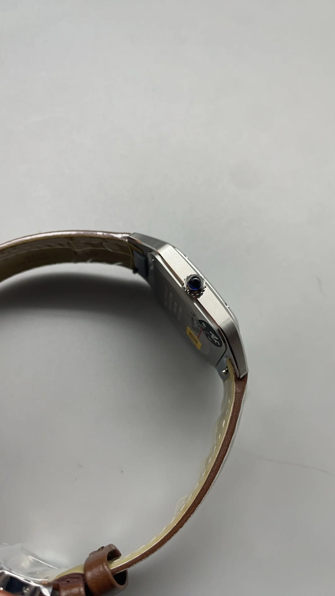 Cartier Santos-Dumont Brown Dial — photographed off the sweep