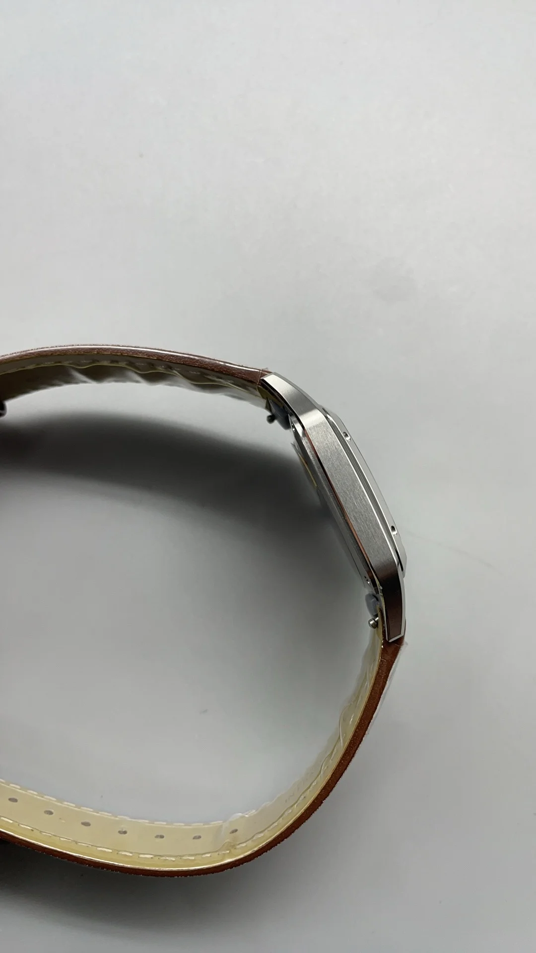 Cartier Santos-Dumont Brown Dial — photographed off the sweep