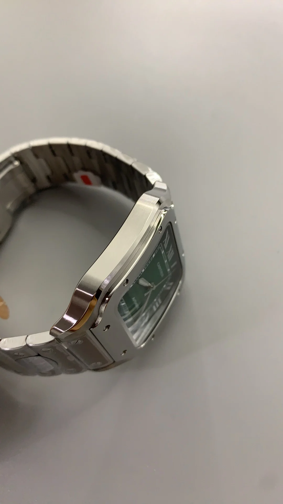 Cartier Santos Green Dial 39.8mm — photographed off the sweep