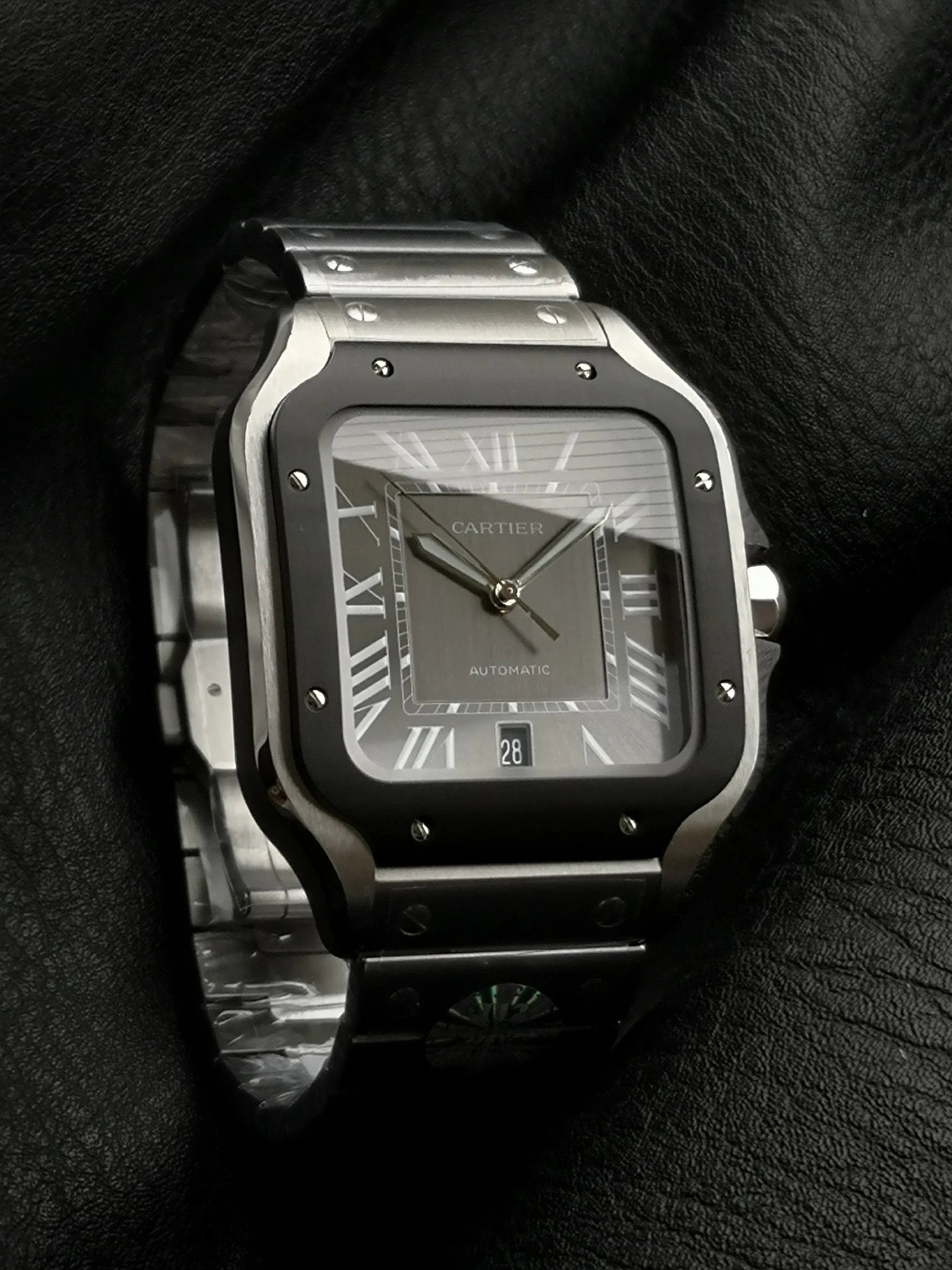 Cartier Santos Steel Black Dial WSSA0037 39.8mm — photographed off the sweep