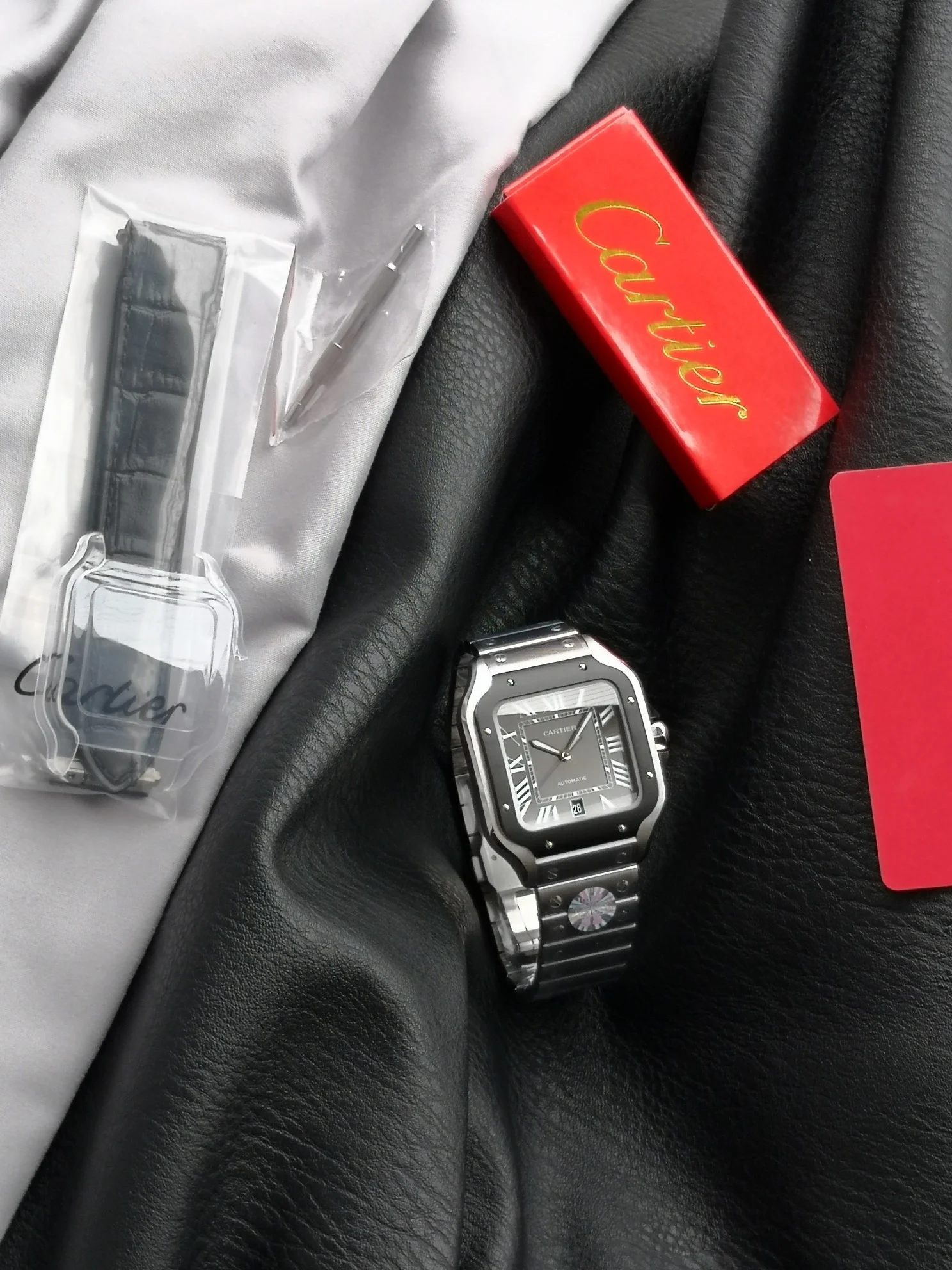 Cartier Santos Steel Black Dial WSSA0037 39.8mm — photographed off the sweep