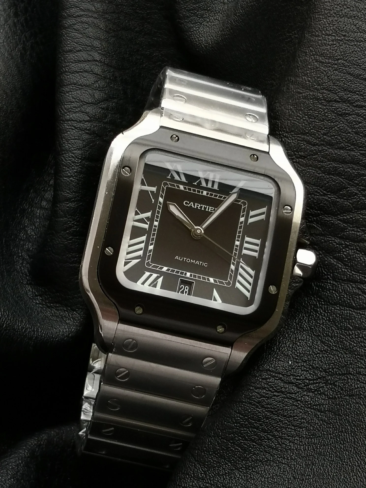 Cartier Santos Steel Black Dial WSSA0037 39.8mm — photographed off the sweep