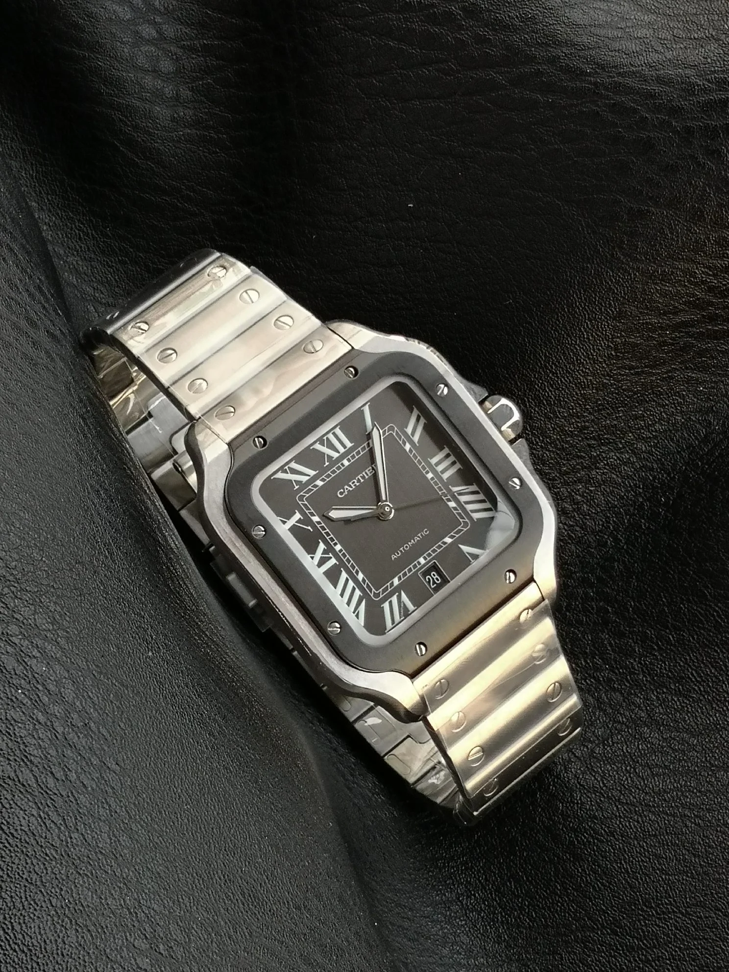 Cartier Santos Steel Black Dial WSSA0037 39.8mm — photographed off the sweep