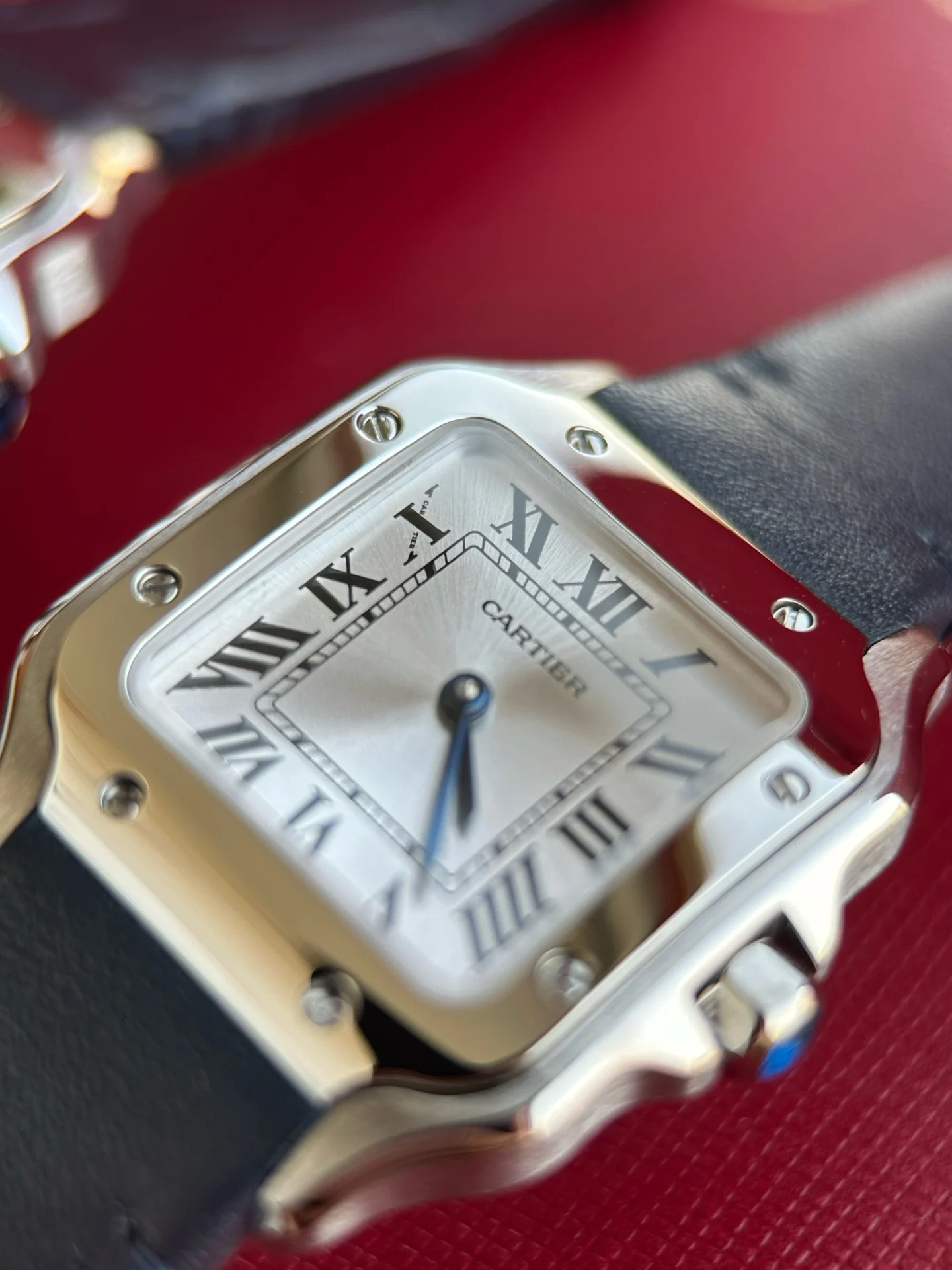 Cartier Santos Steel Silver Dial WSSA0082 27mm — photographed off the sweep