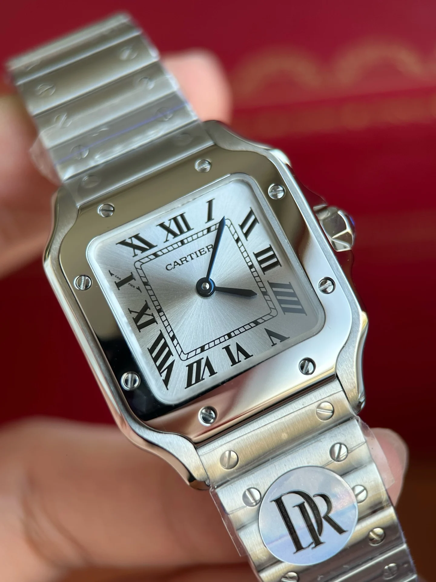 Cartier Santos Steel Silver Dial WSSA0082 27mm — photographed off the sweep