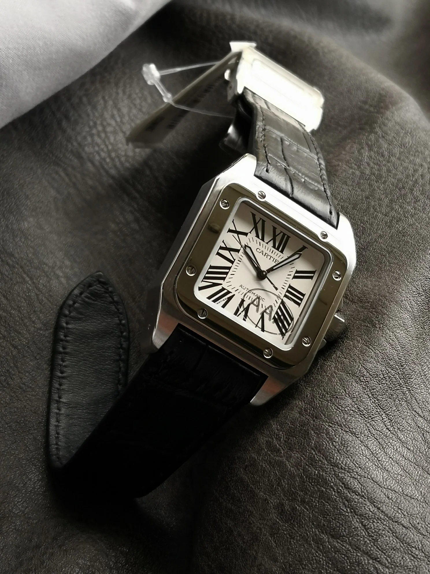Cartier Santos Steel White Dial — photographed off the sweep