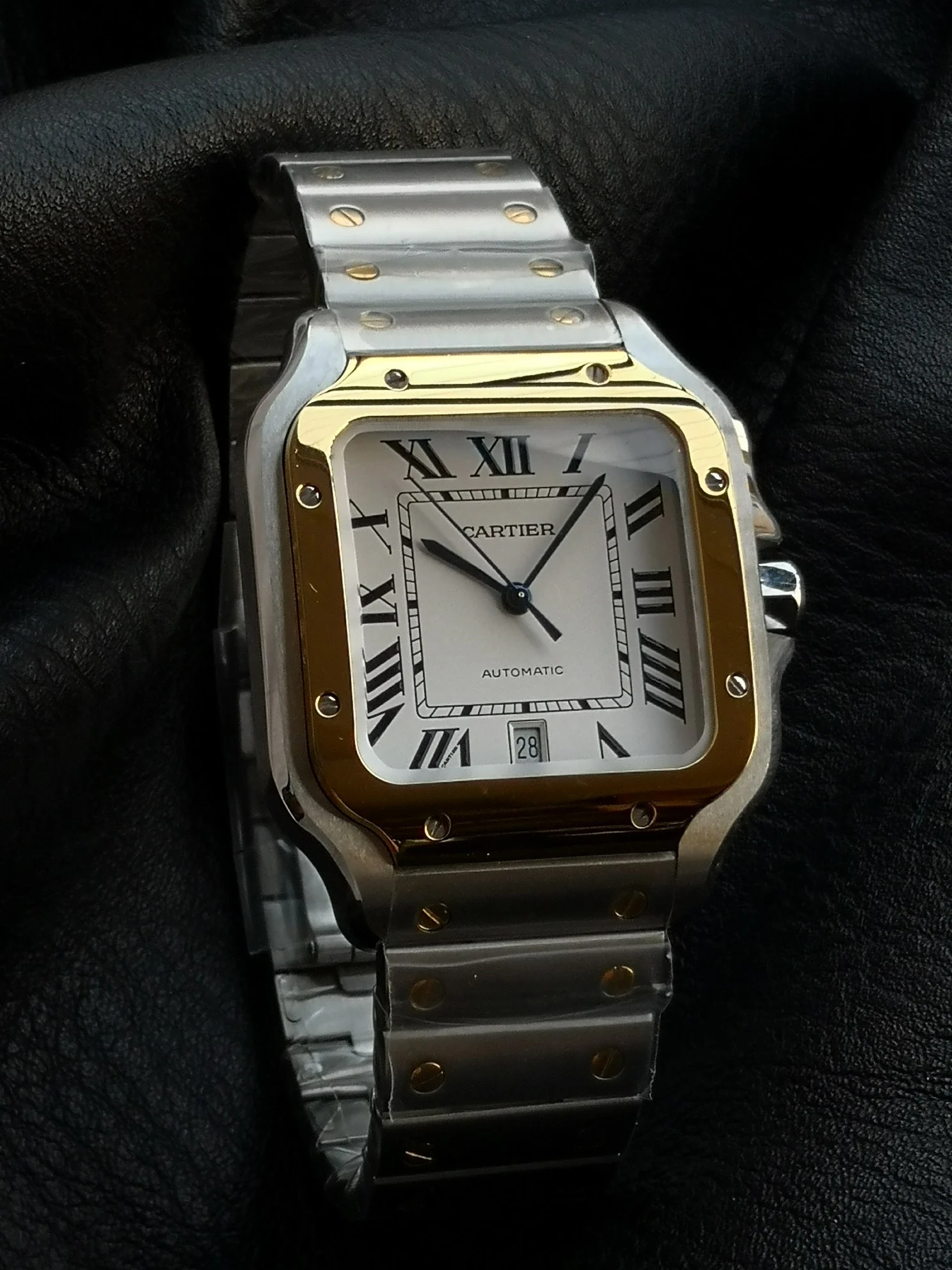 Cartier Santos Two-Tone 39.8mm — photographed off the sweep