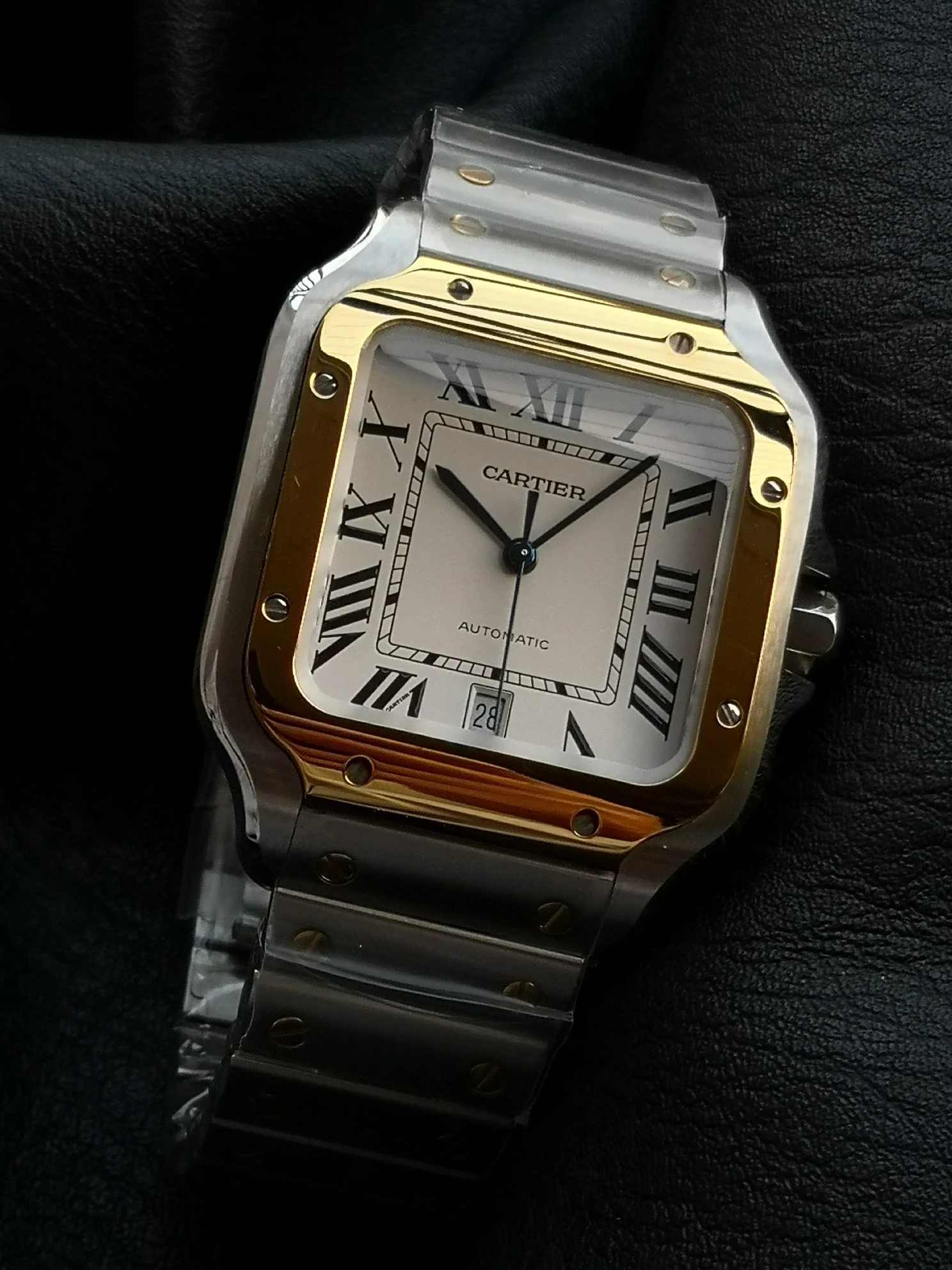 Cartier Santos Two-Tone 39.8mm — photographed off the sweep