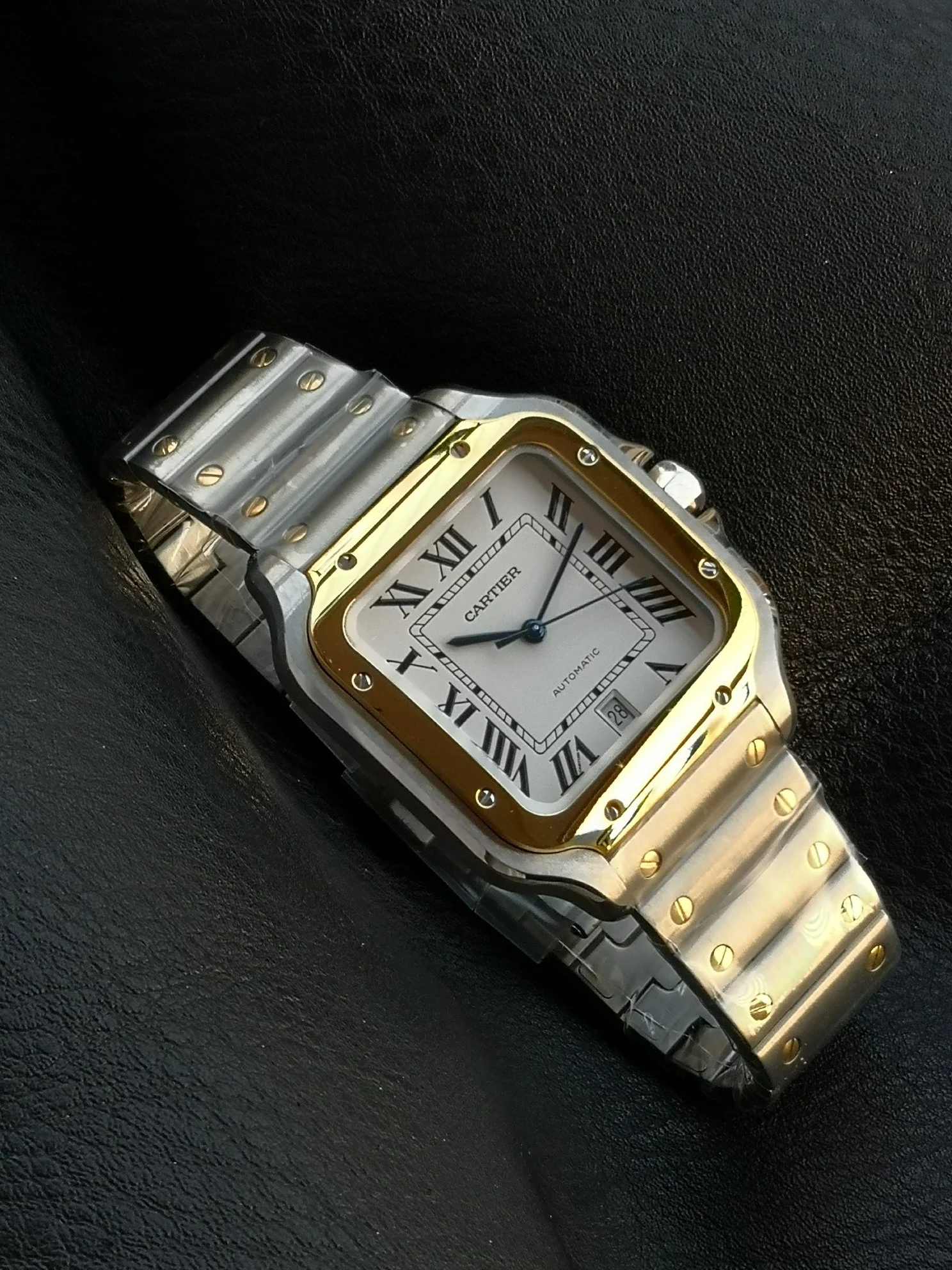 Cartier Santos Two-Tone 39.8mm — photographed off the sweep