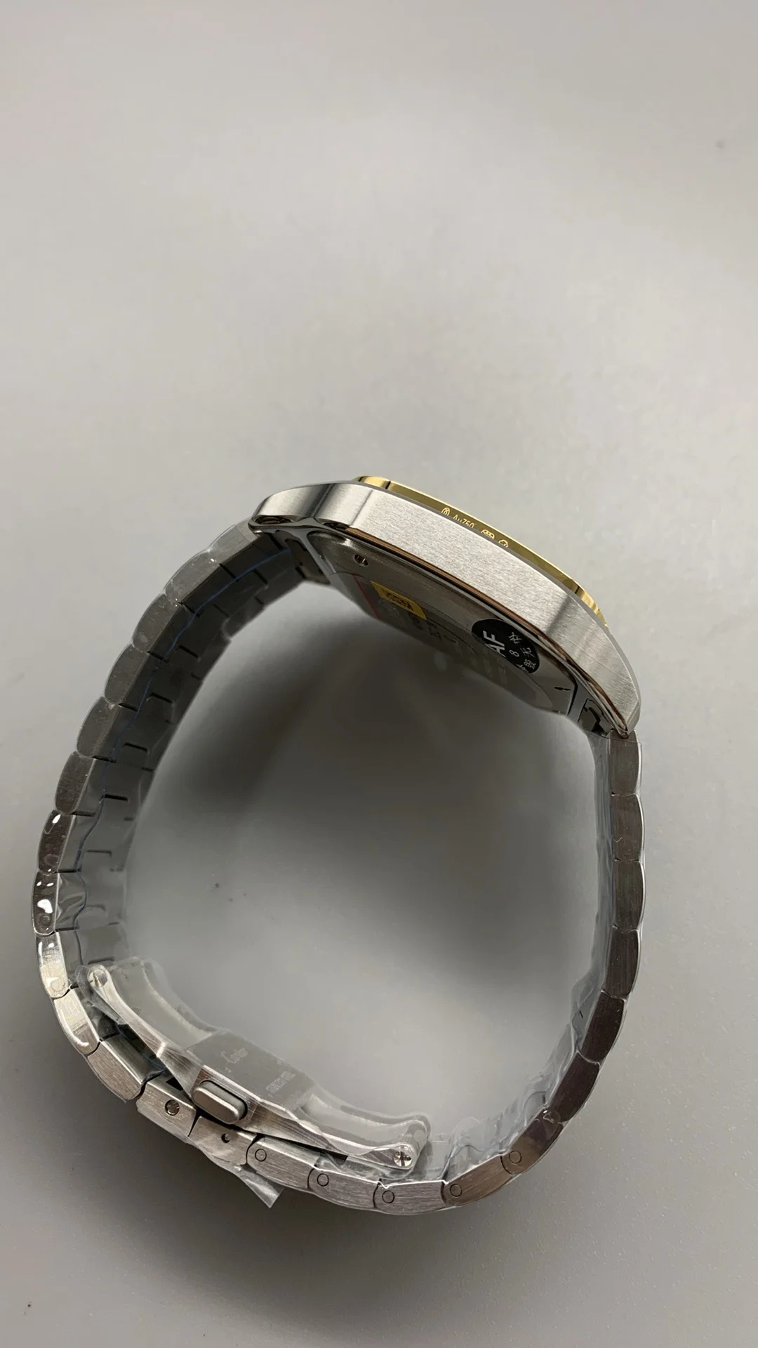 Cartier Santos Two-Tone Black Dial — photographed off the sweep