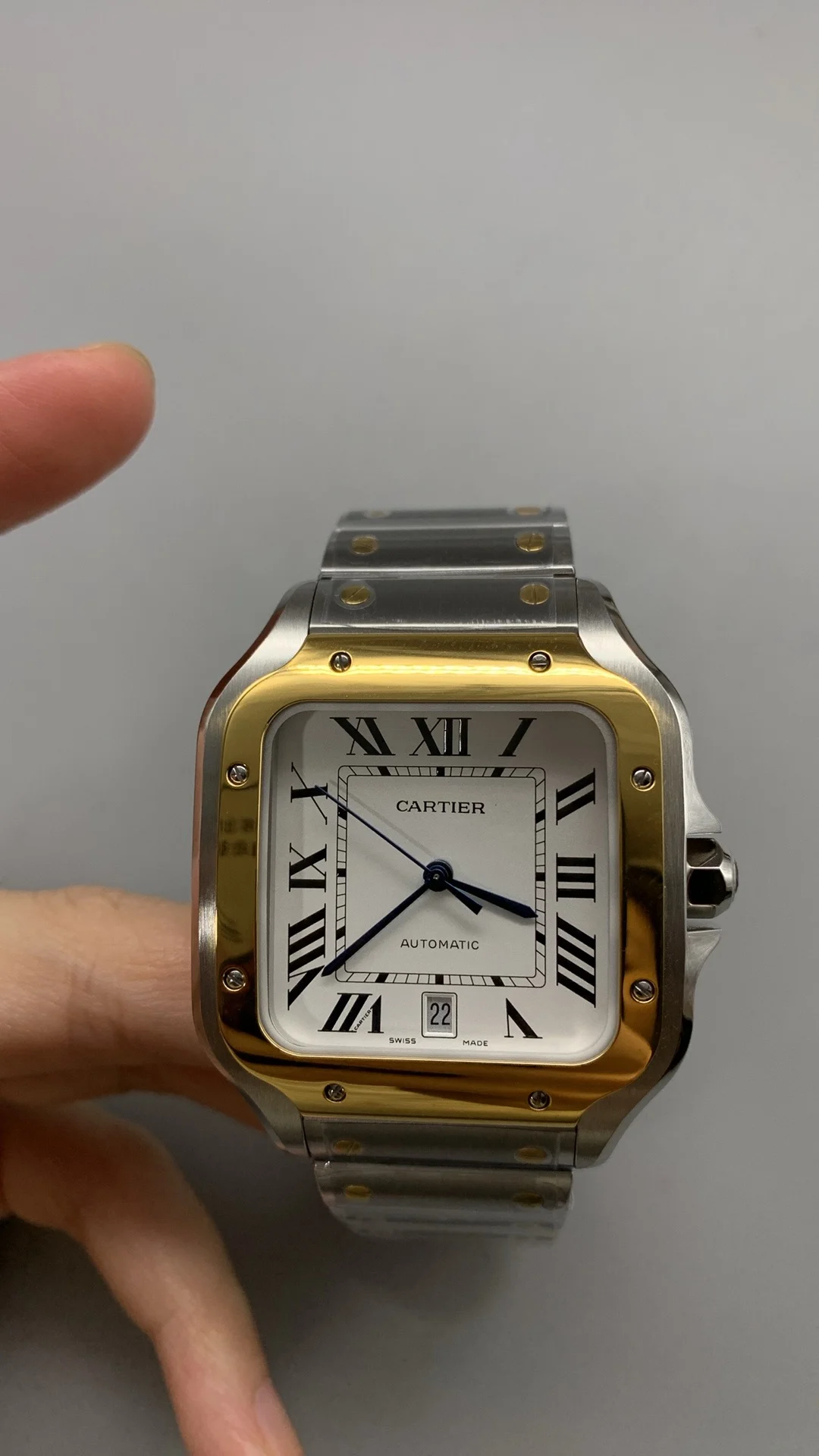 Cartier Santos Two-Tone White Dial 40mm — photographed off the sweep
