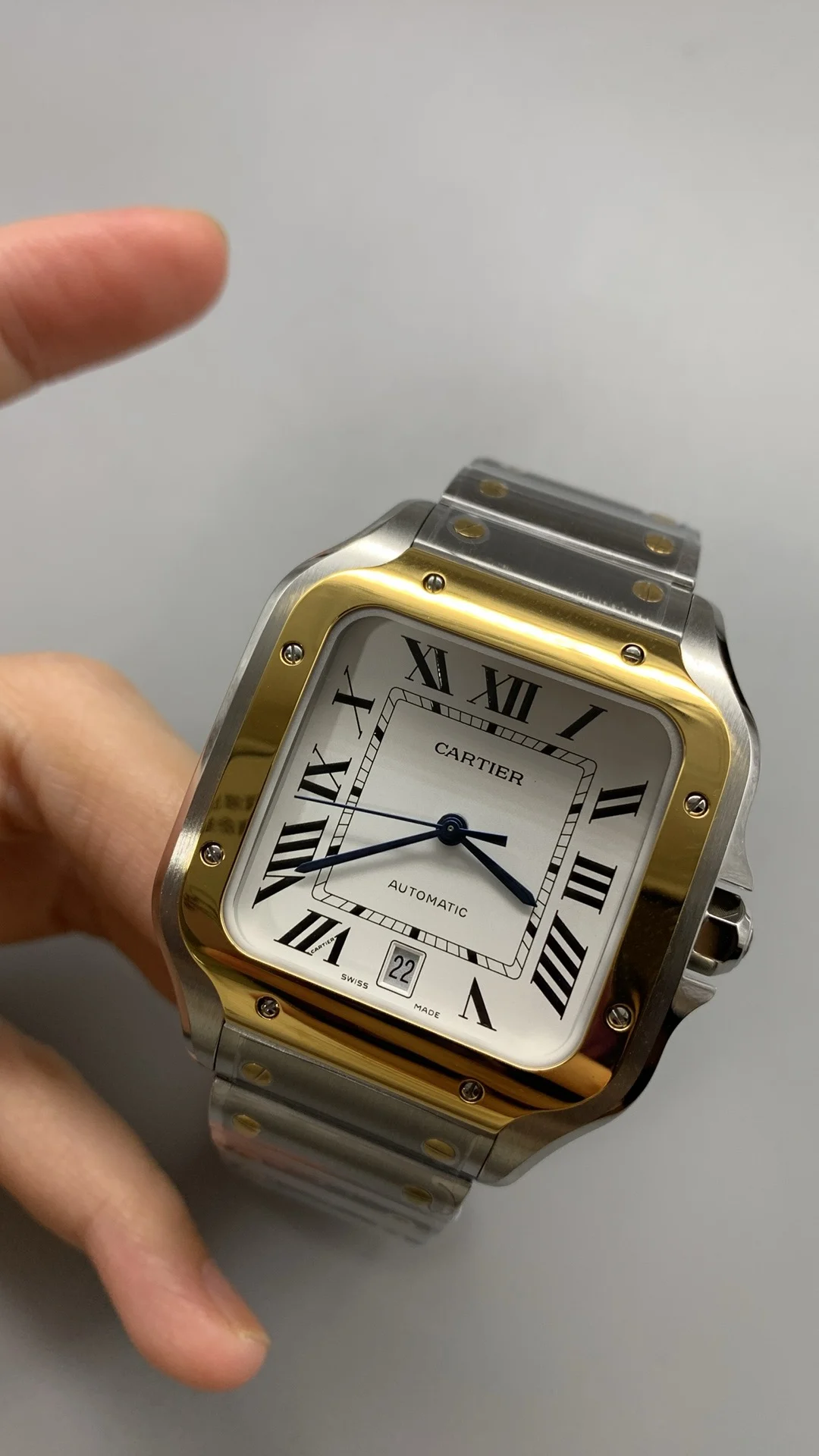 Cartier Santos Two-Tone White Dial 40mm — photographed off the sweep