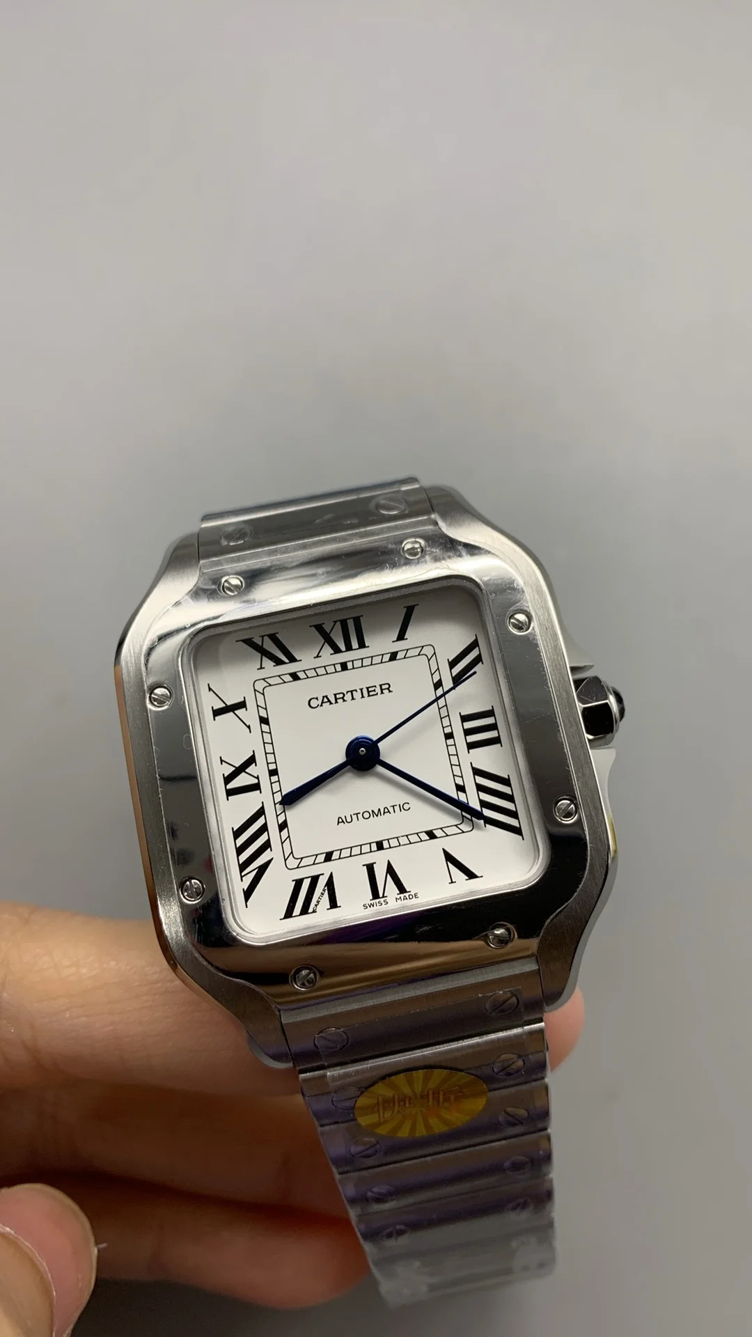 Cartier Santos White Dial 35mm — photographed off the sweep