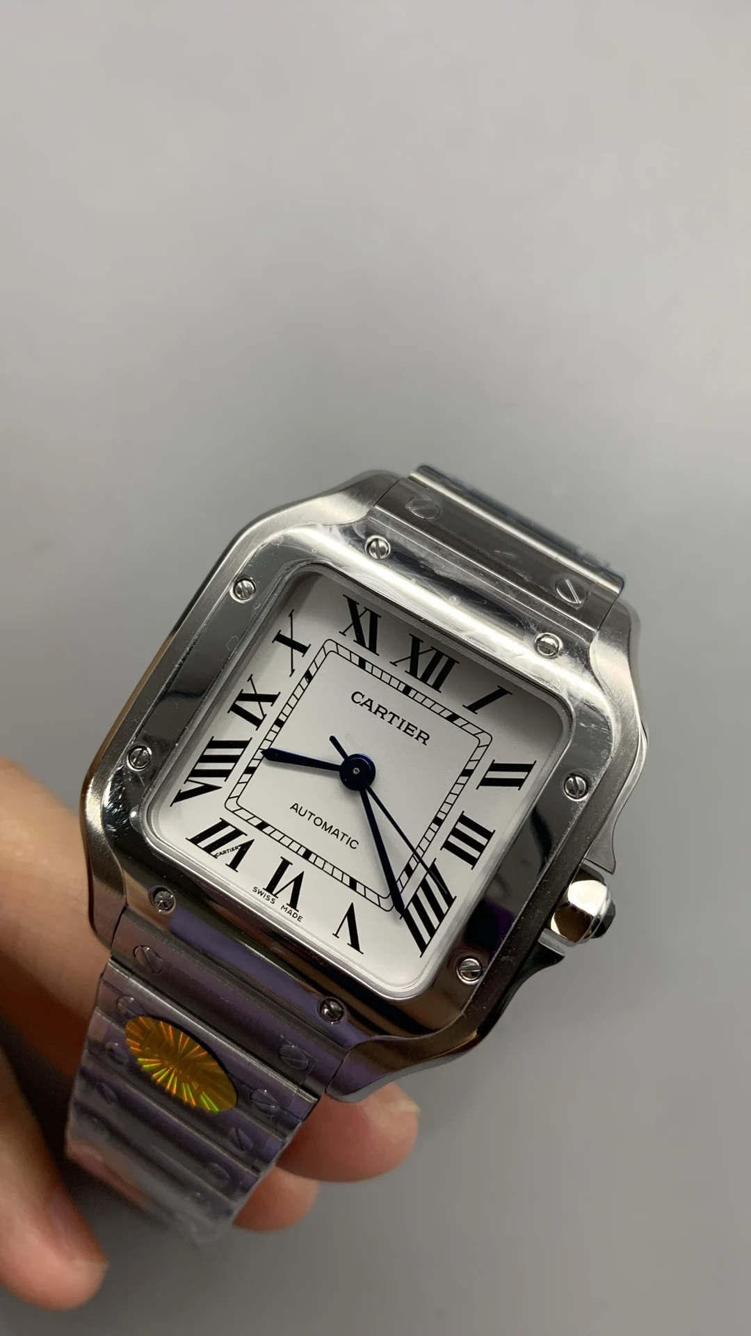Cartier Santos White Dial 35mm — photographed off the sweep