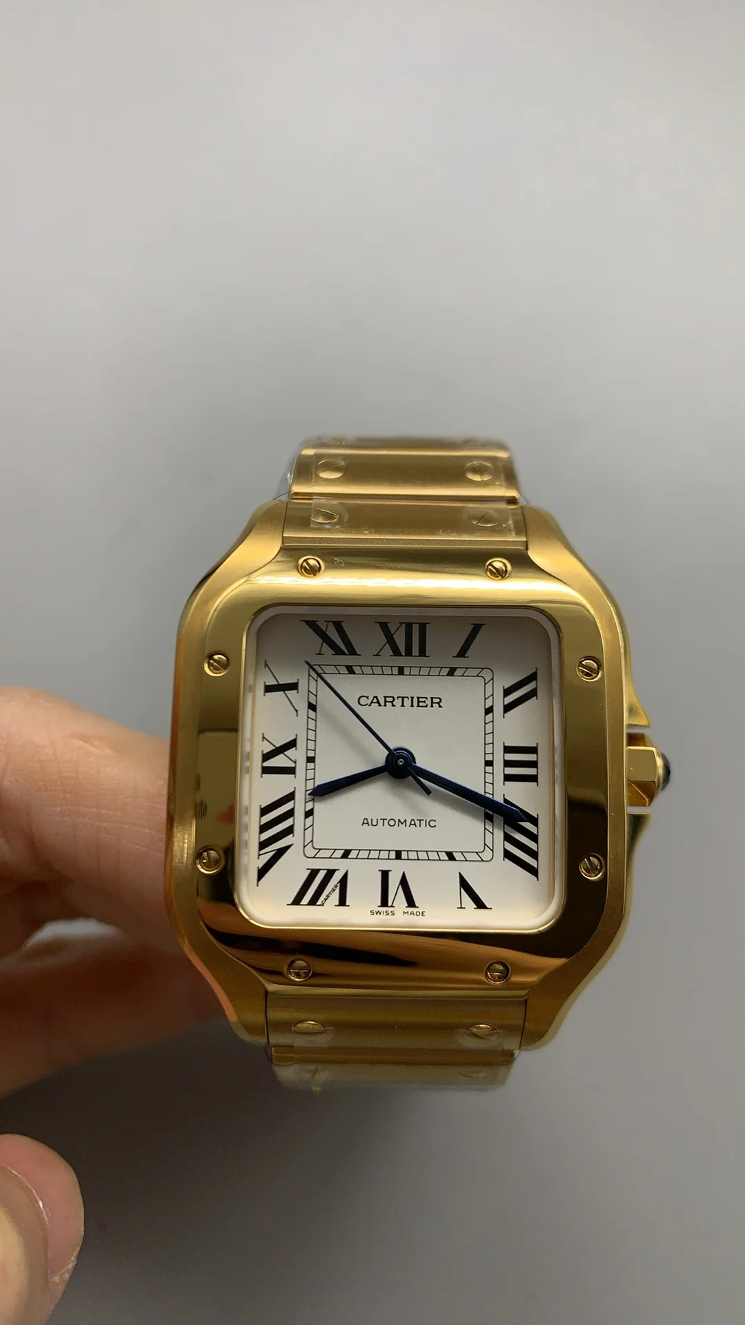 Cartier Santos White Dial 35mm — photographed off the sweep