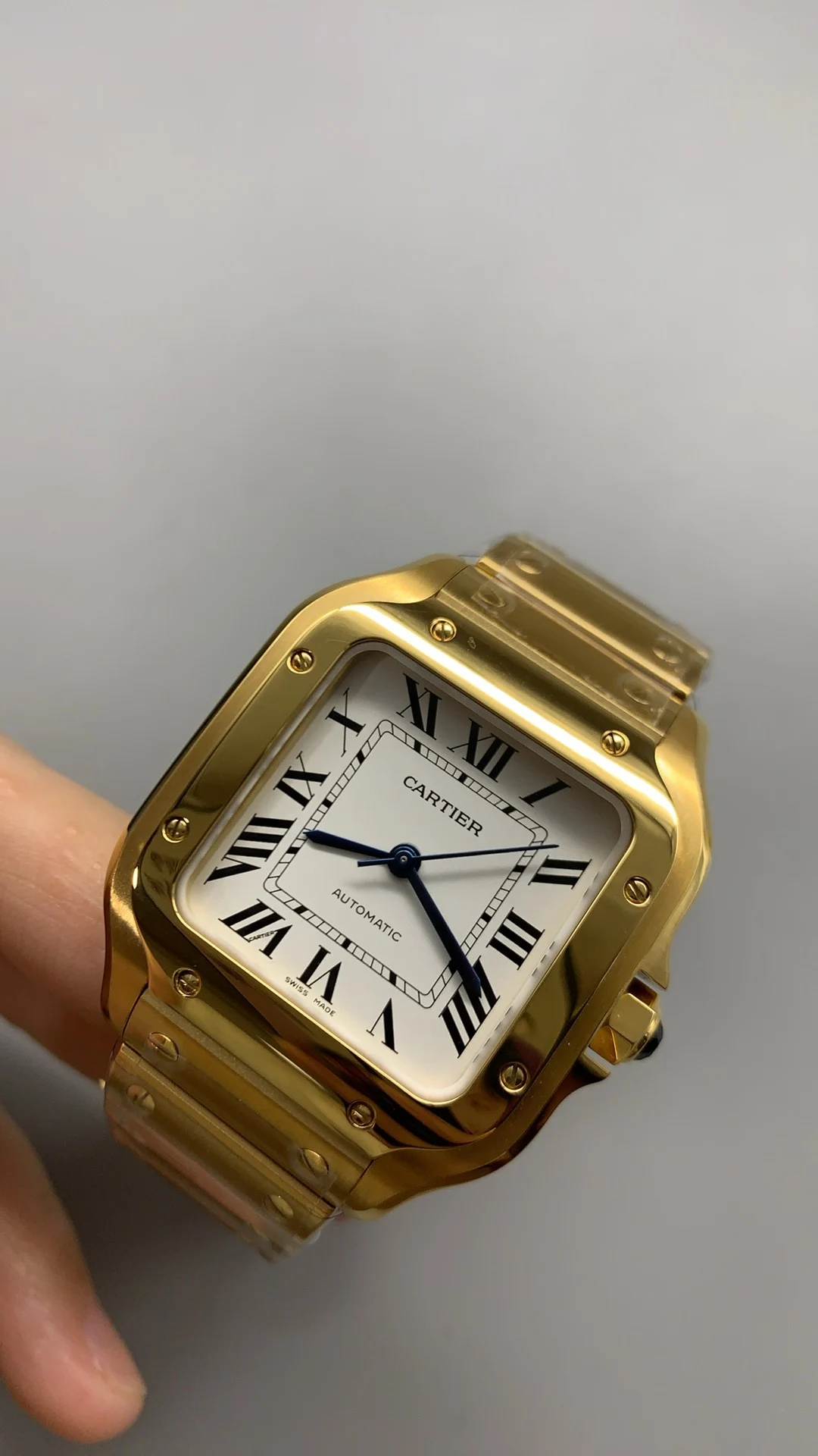 Cartier Santos White Dial 35mm — photographed off the sweep