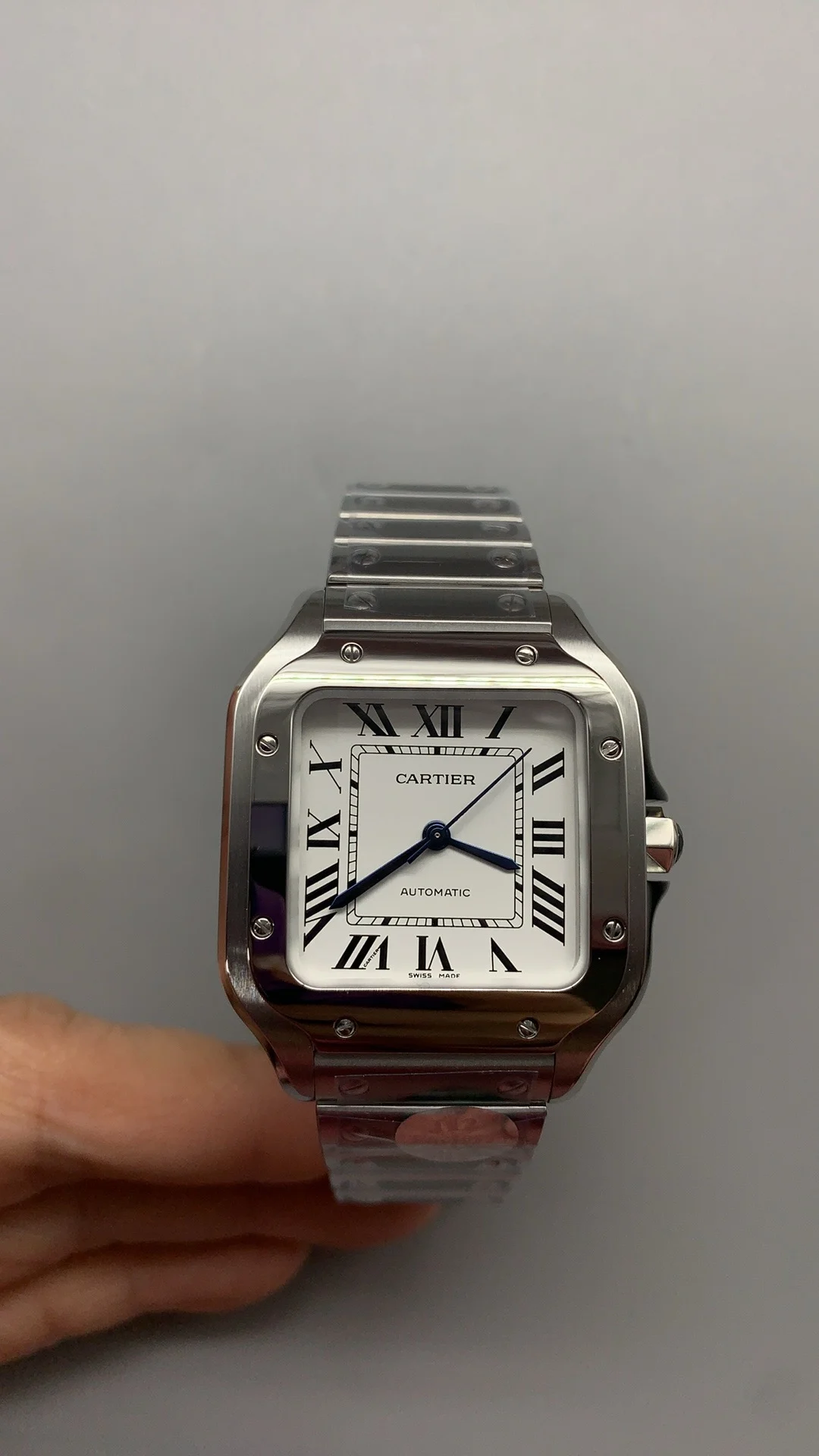 Cartier Santos White Dial 35mm — photographed off the sweep