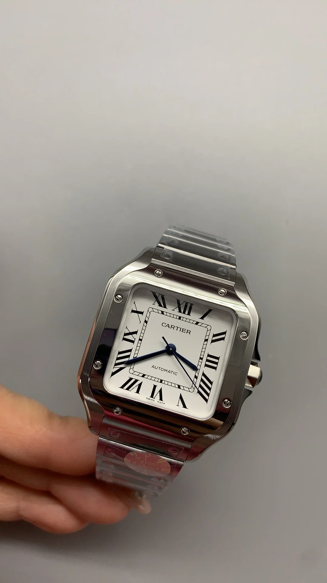 Cartier Santos White Dial 35mm — photographed off the sweep
