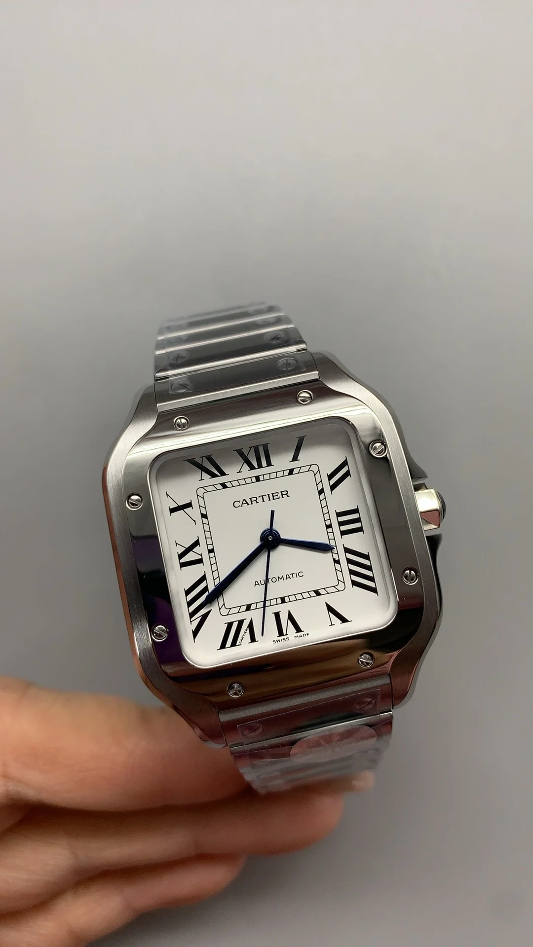 Cartier Santos White Dial 35mm — photographed off the sweep