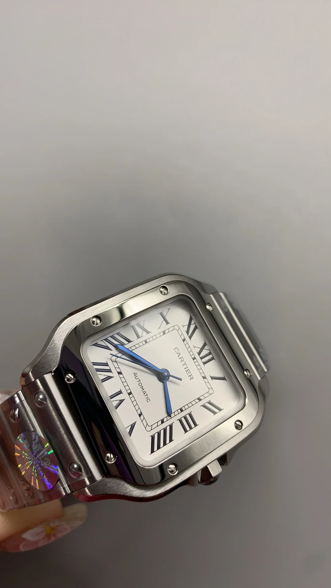 Cartier Santos White Dial 35mm — photographed off the sweep