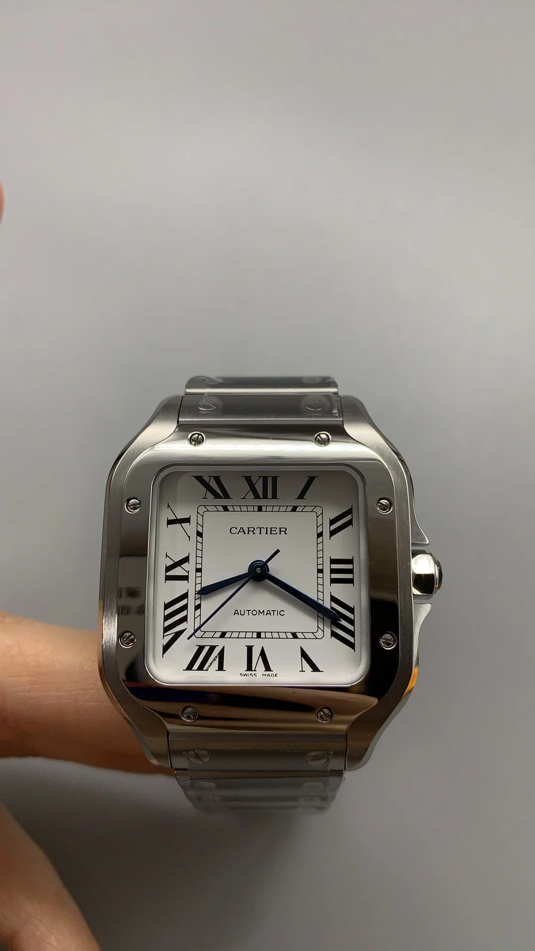 Cartier Santos White Dial 35mm — photographed off the sweep