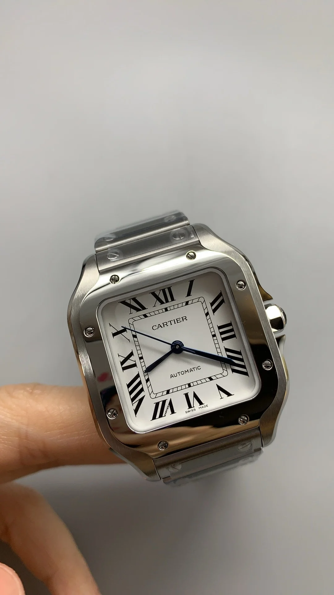 Cartier Santos White Dial 35mm — photographed off the sweep