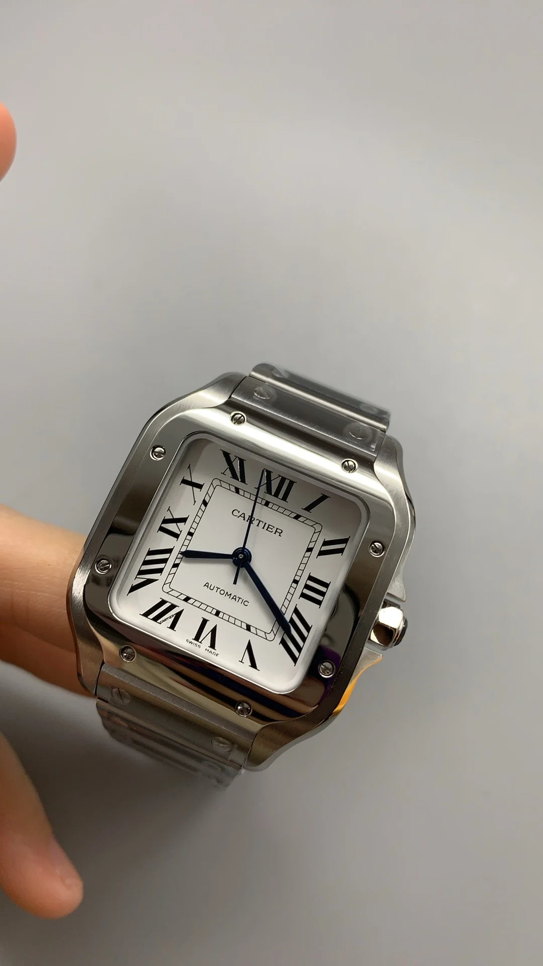 Cartier Santos White Dial 35mm — photographed off the sweep