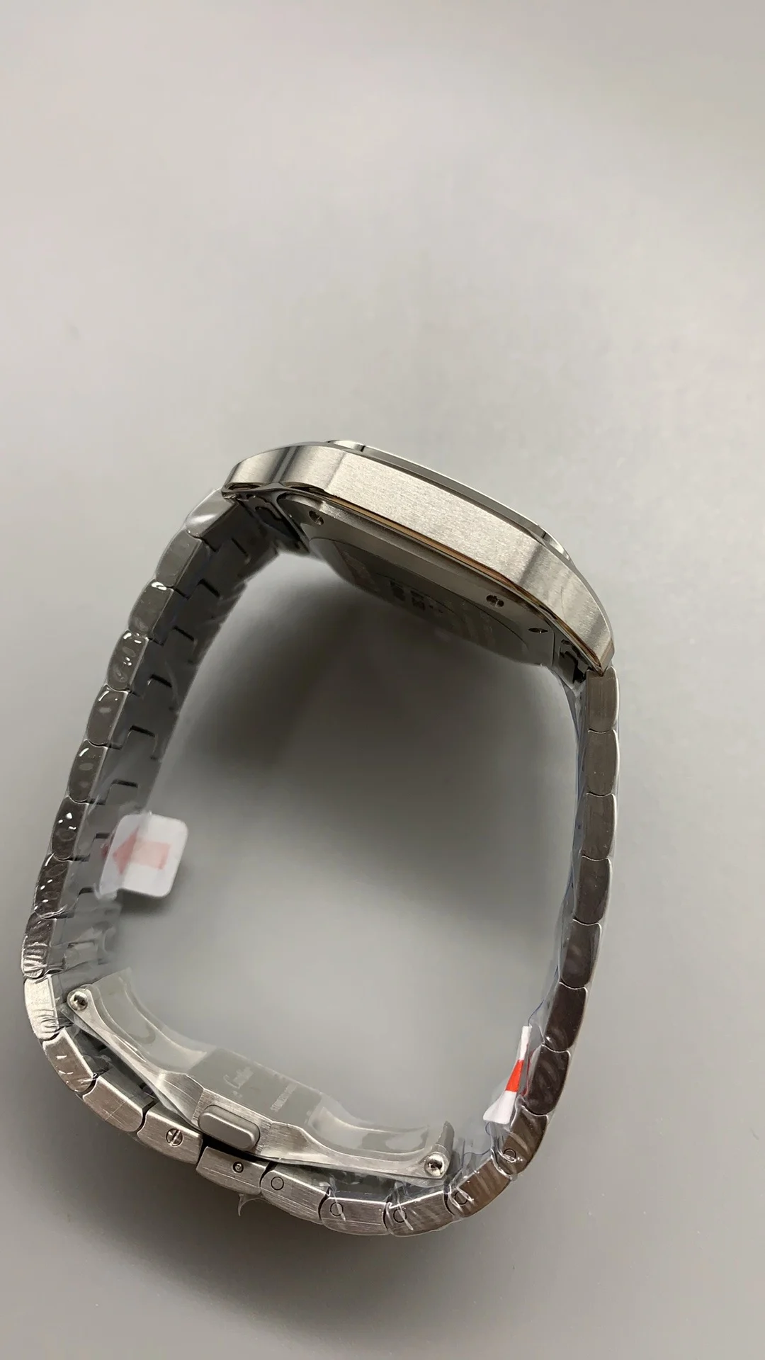 Cartier Santos White Dial 35mm — photographed off the sweep