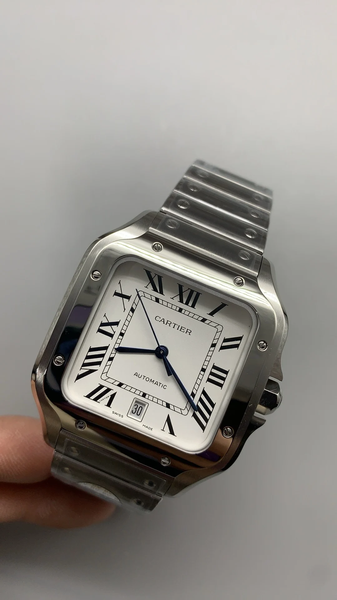 Cartier Santos White Dial 39.8mm — photographed off the sweep