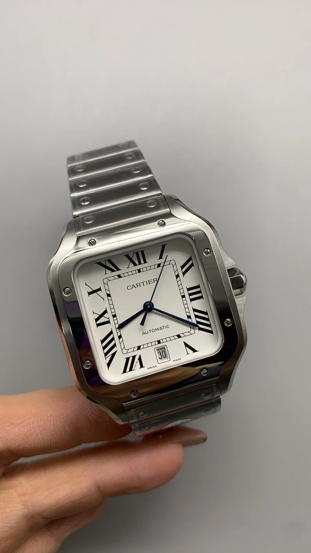 Cartier Santos White Dial 39.8mm — photographed off the sweep