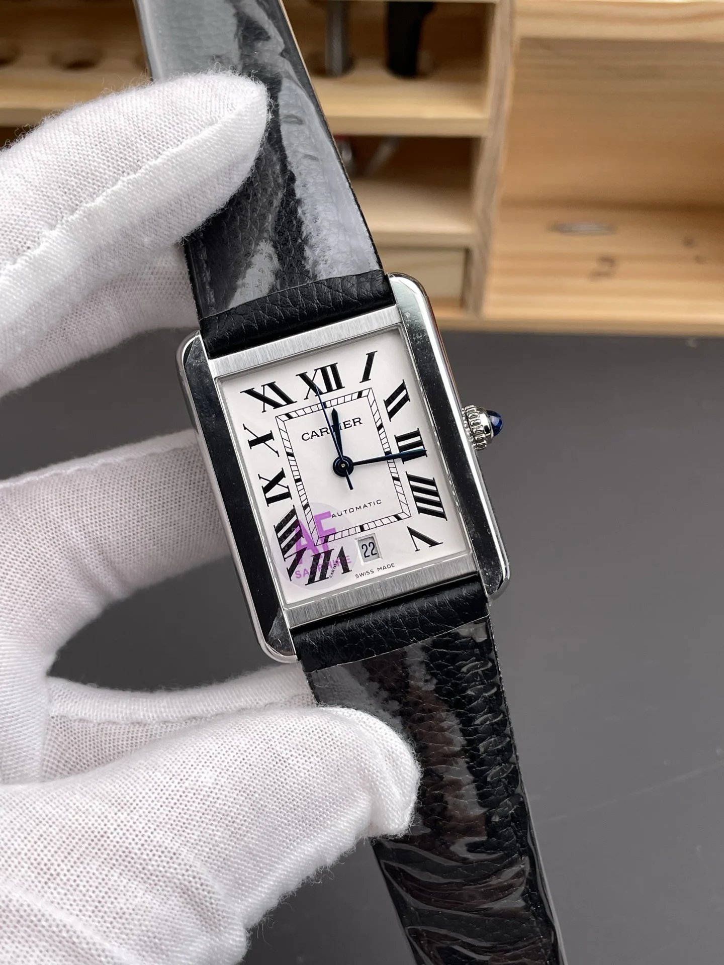 Cartier Tank 31 × 40.85mm — photographed off the sweep