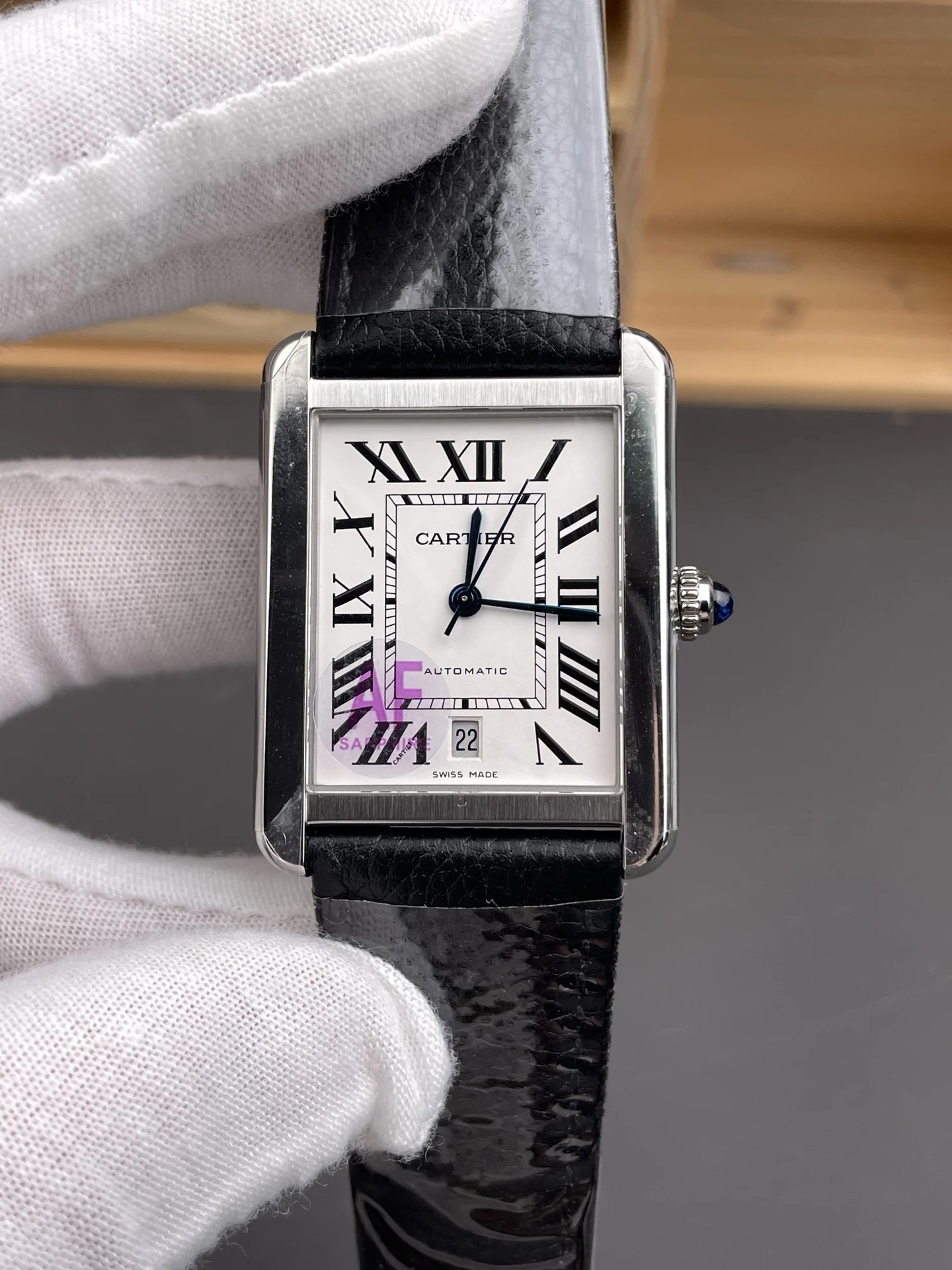 Cartier Tank 31 × 40.85mm — photographed off the sweep