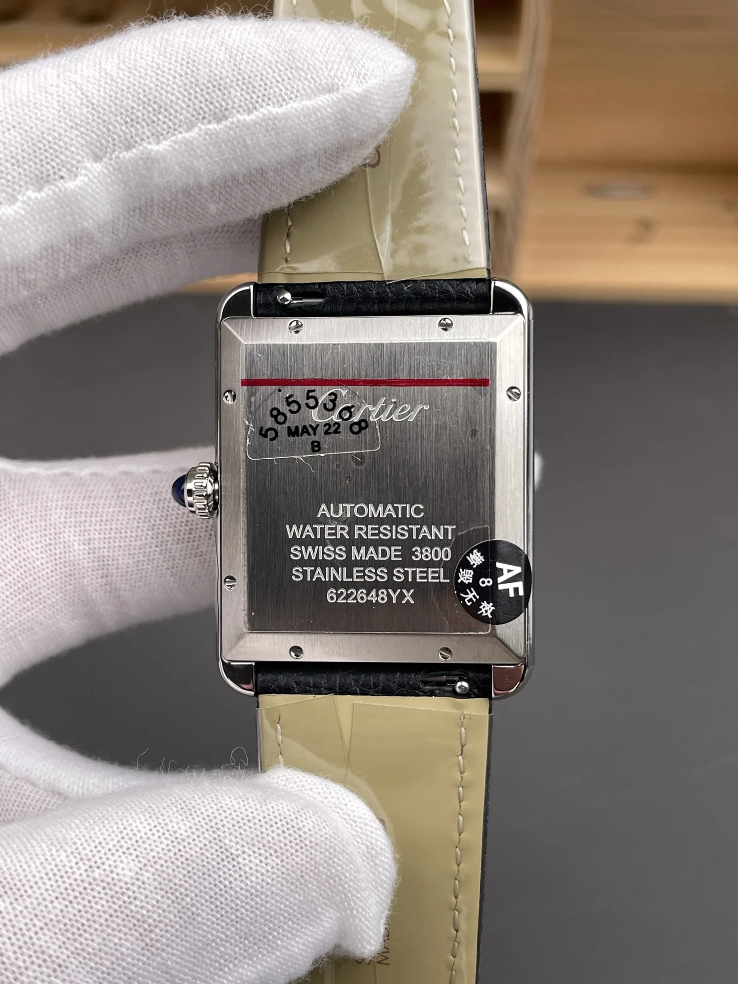 Cartier Tank 31 × 40.85mm — photographed off the sweep