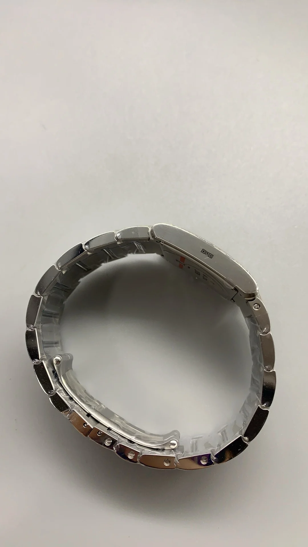 Cartier Tank 32 × 27mm — photographed off the sweep