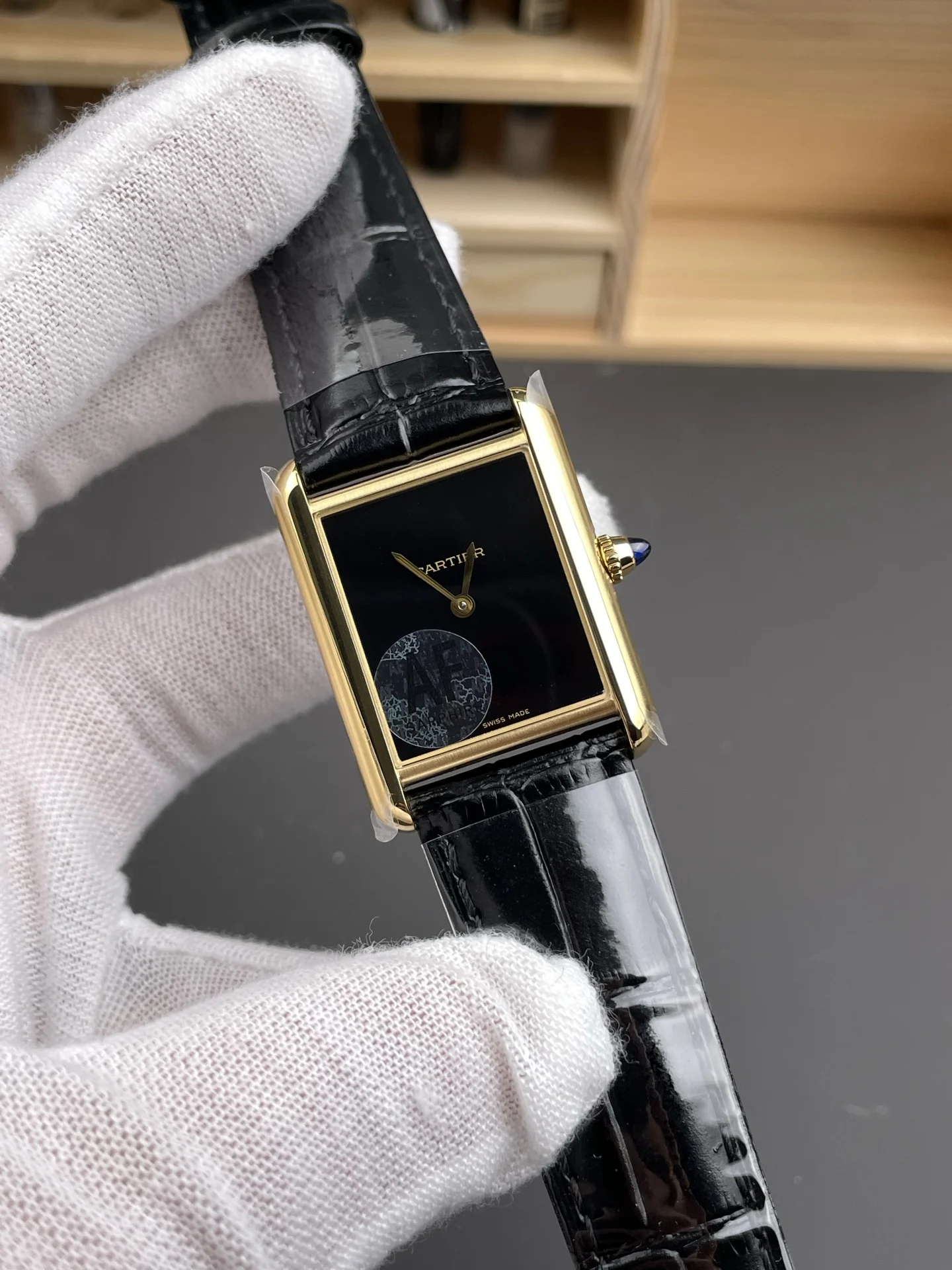 Cartier Tank 33.7 × 25.5mm — photographed off the sweep