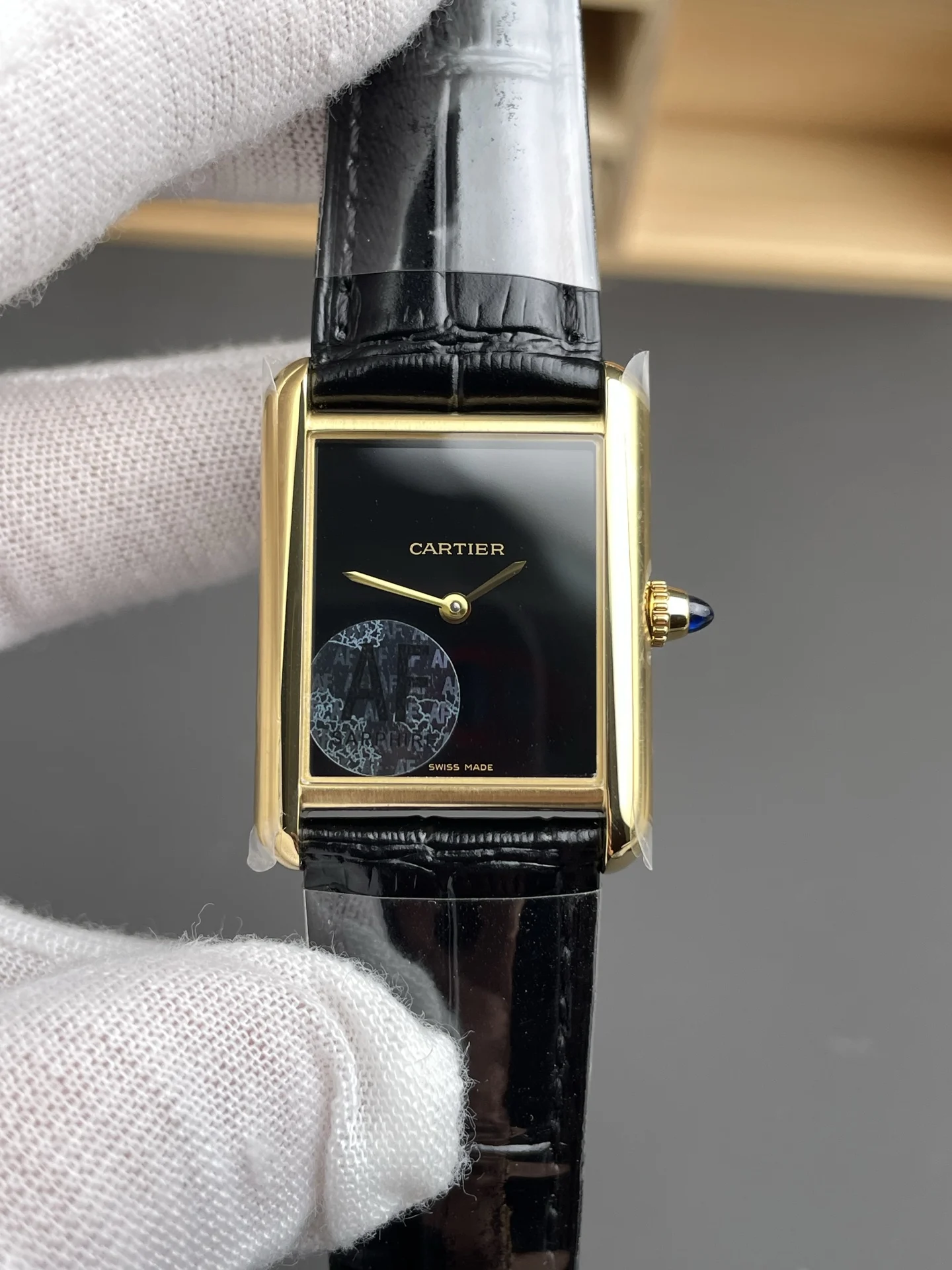 Cartier Tank 33.7 × 25.5mm — photographed off the sweep