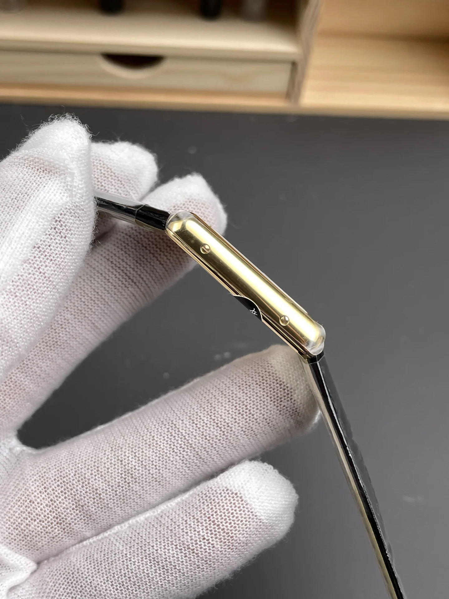 Cartier Tank 33.7 × 25.5mm — photographed off the sweep