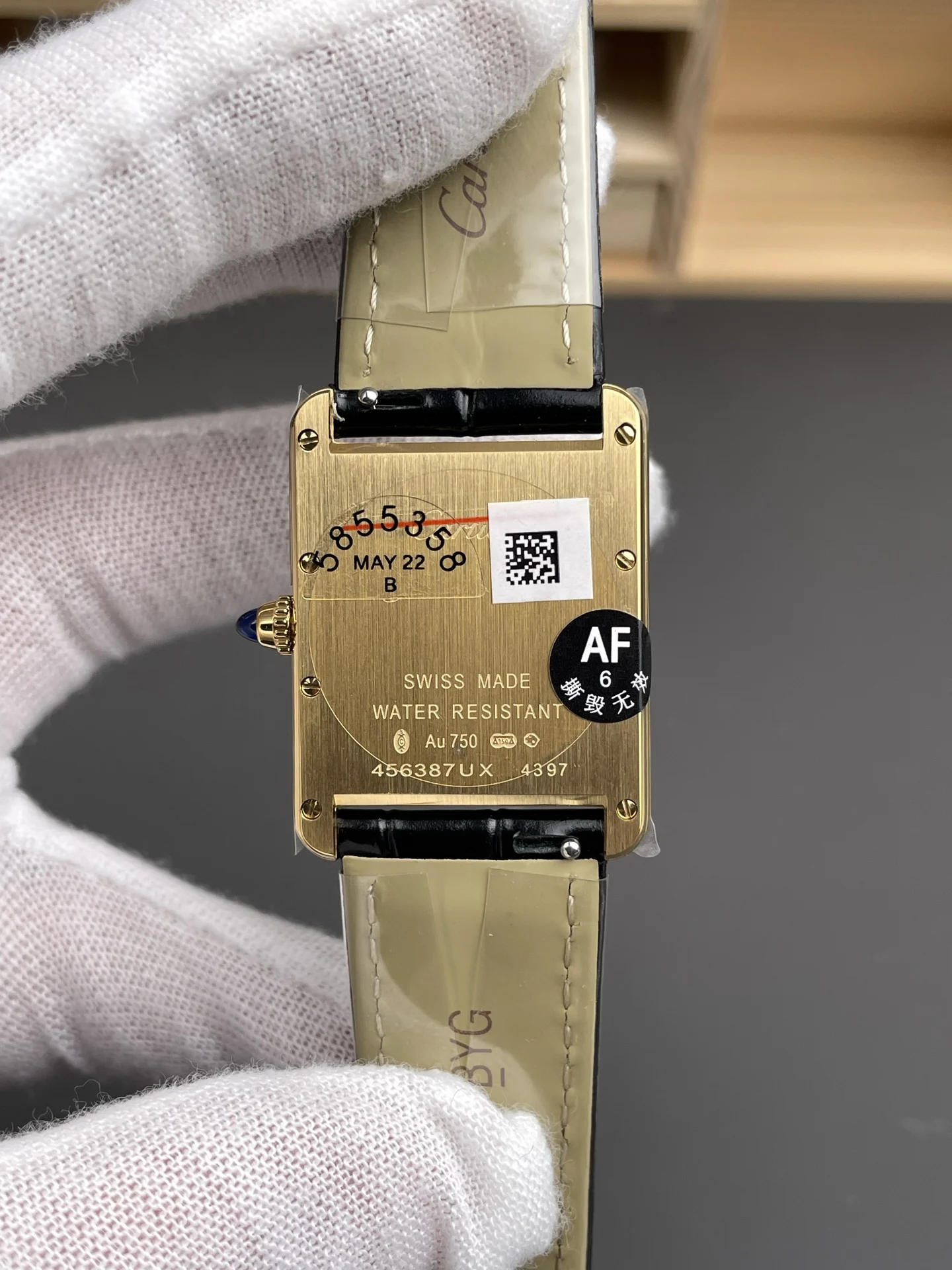 Cartier Tank 33.7 × 25.5mm — photographed off the sweep