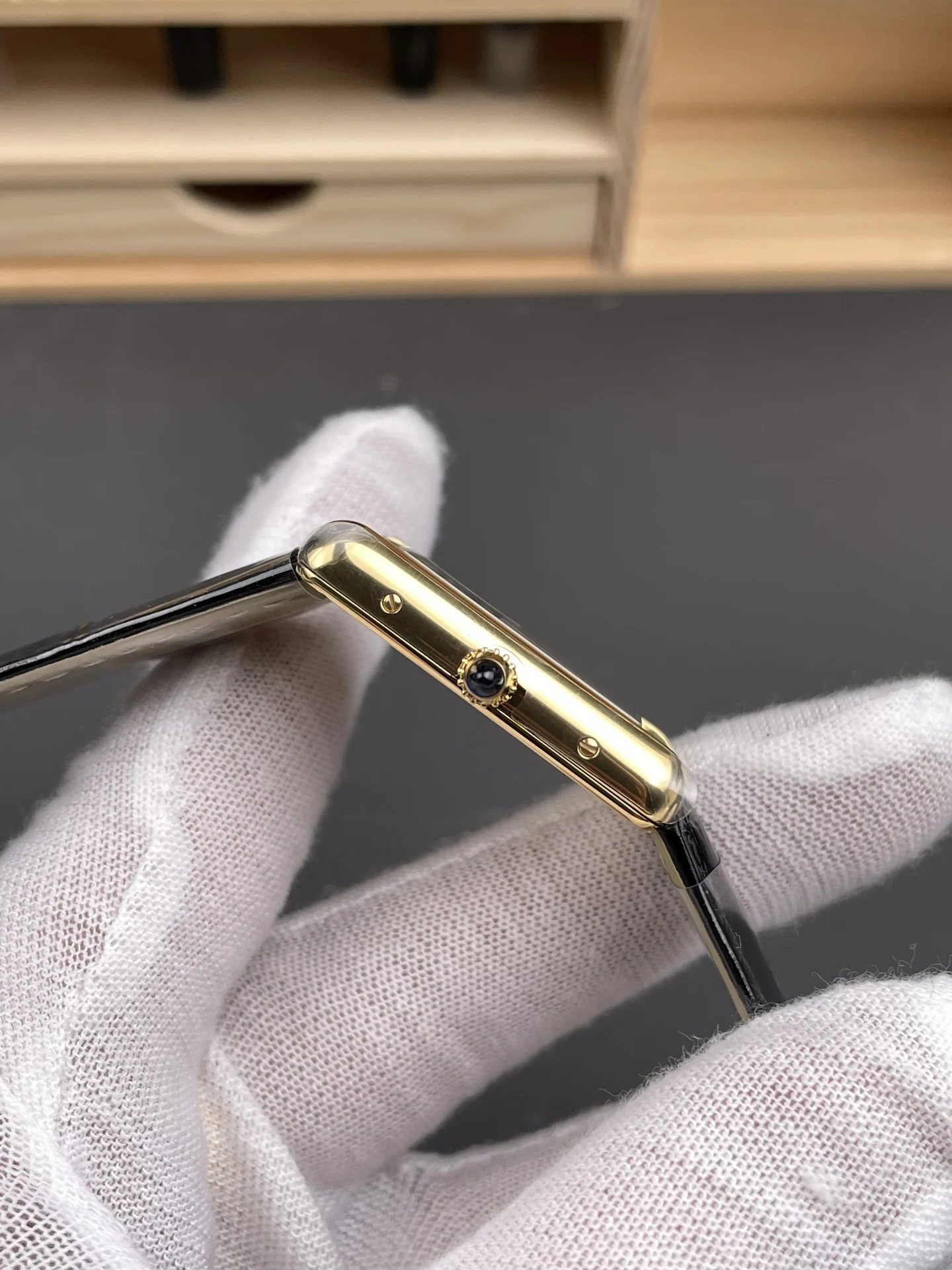 Cartier Tank 33.7 × 25.5mm — photographed off the sweep